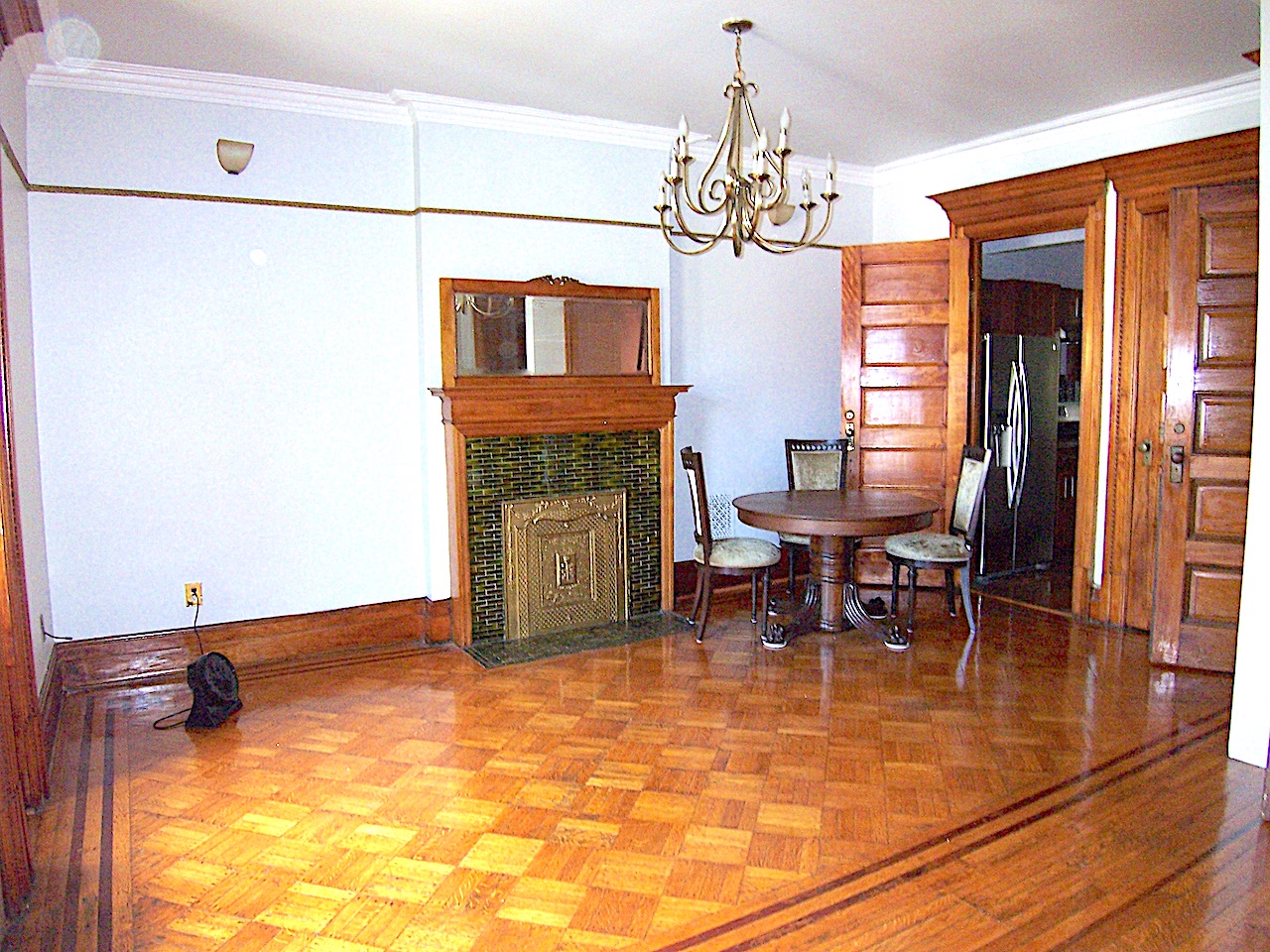 864 Prospect Place, Unit 2 Brooklyn, NY 11216 - Photo 2 of 6 a view of a dining room with furniture and a chandelier