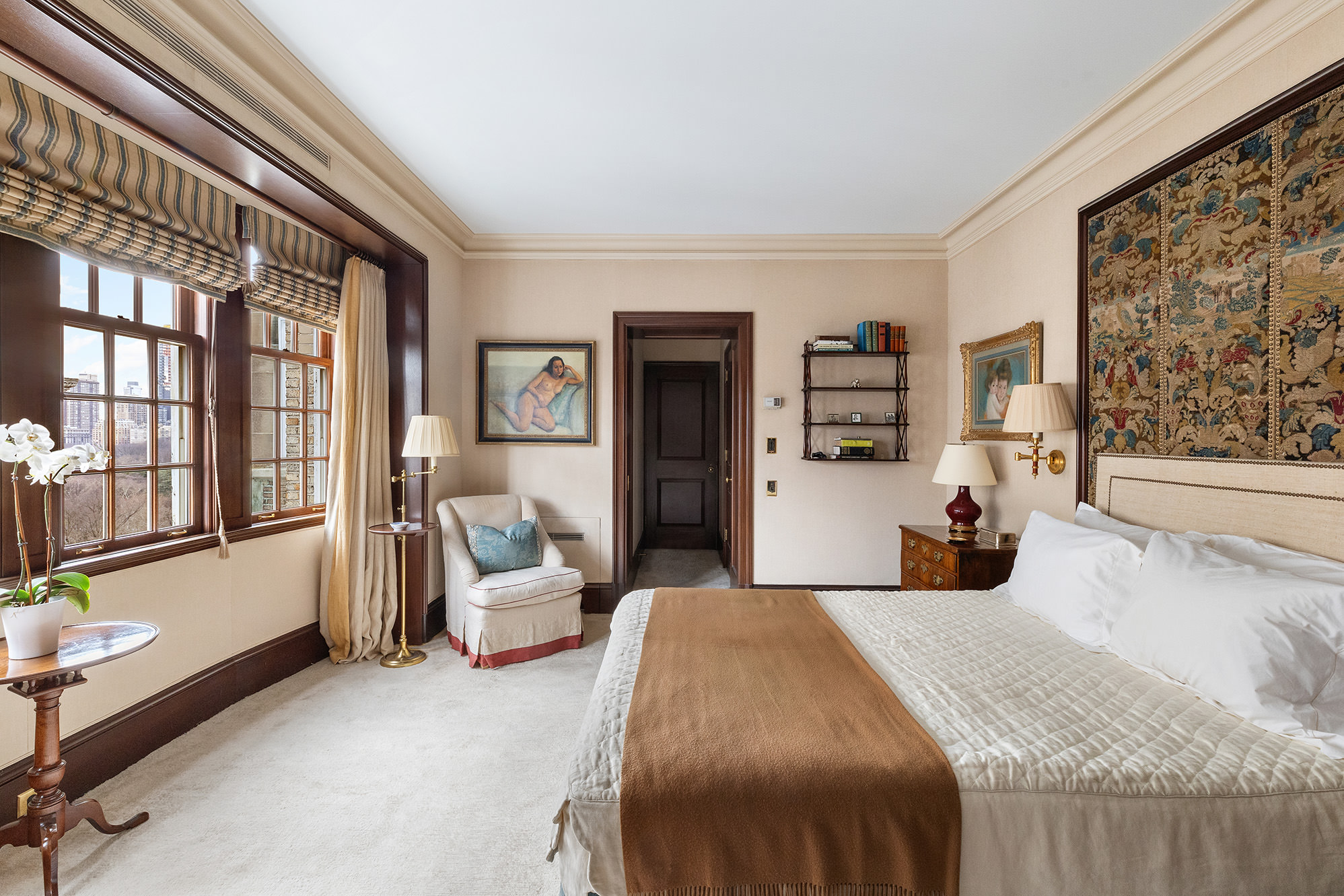 953 5th Avenue, Unit PH Manhattan, NY 10075 - Photo 16 of 27 a bedroom with a bed couch and a large window