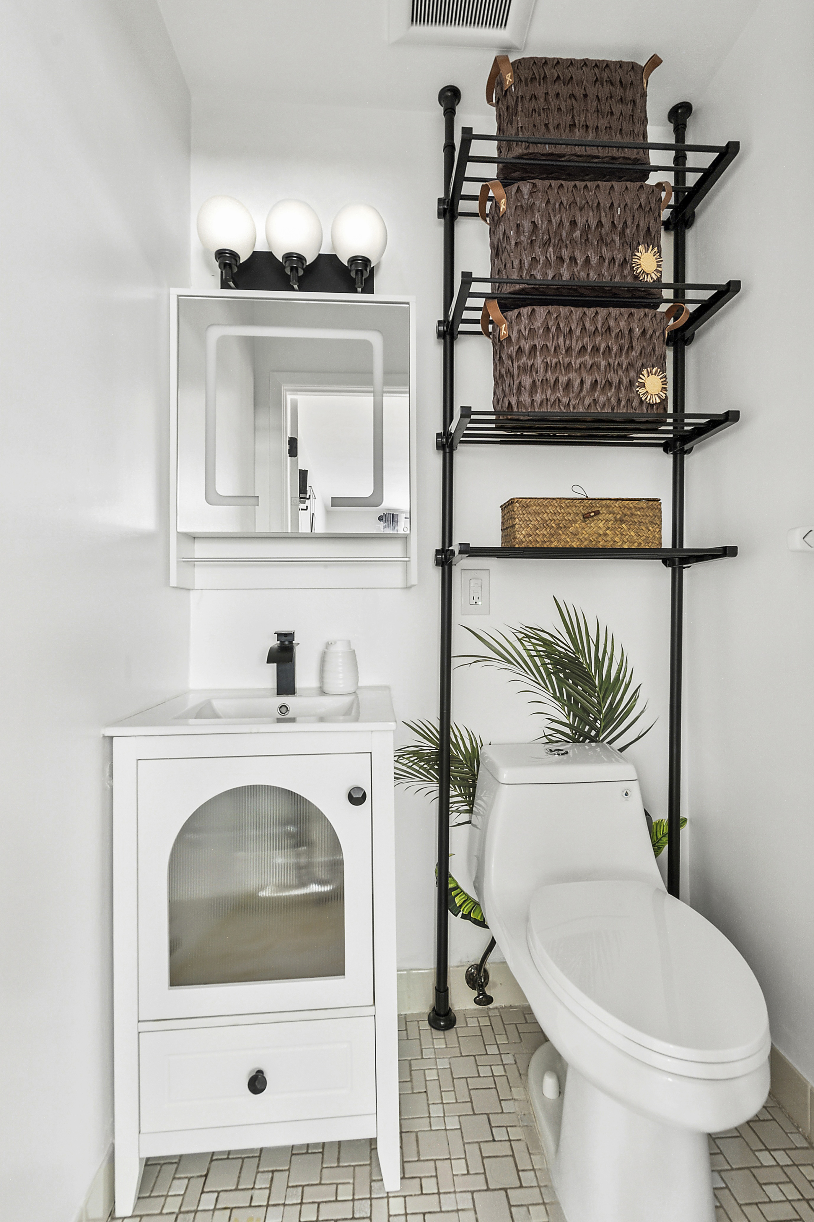 143 Bay Ridge Parkway, Unit 3 Brooklyn, NY 11209 - Photo 6 of 12 a bathroom with a toilet a sink and a window