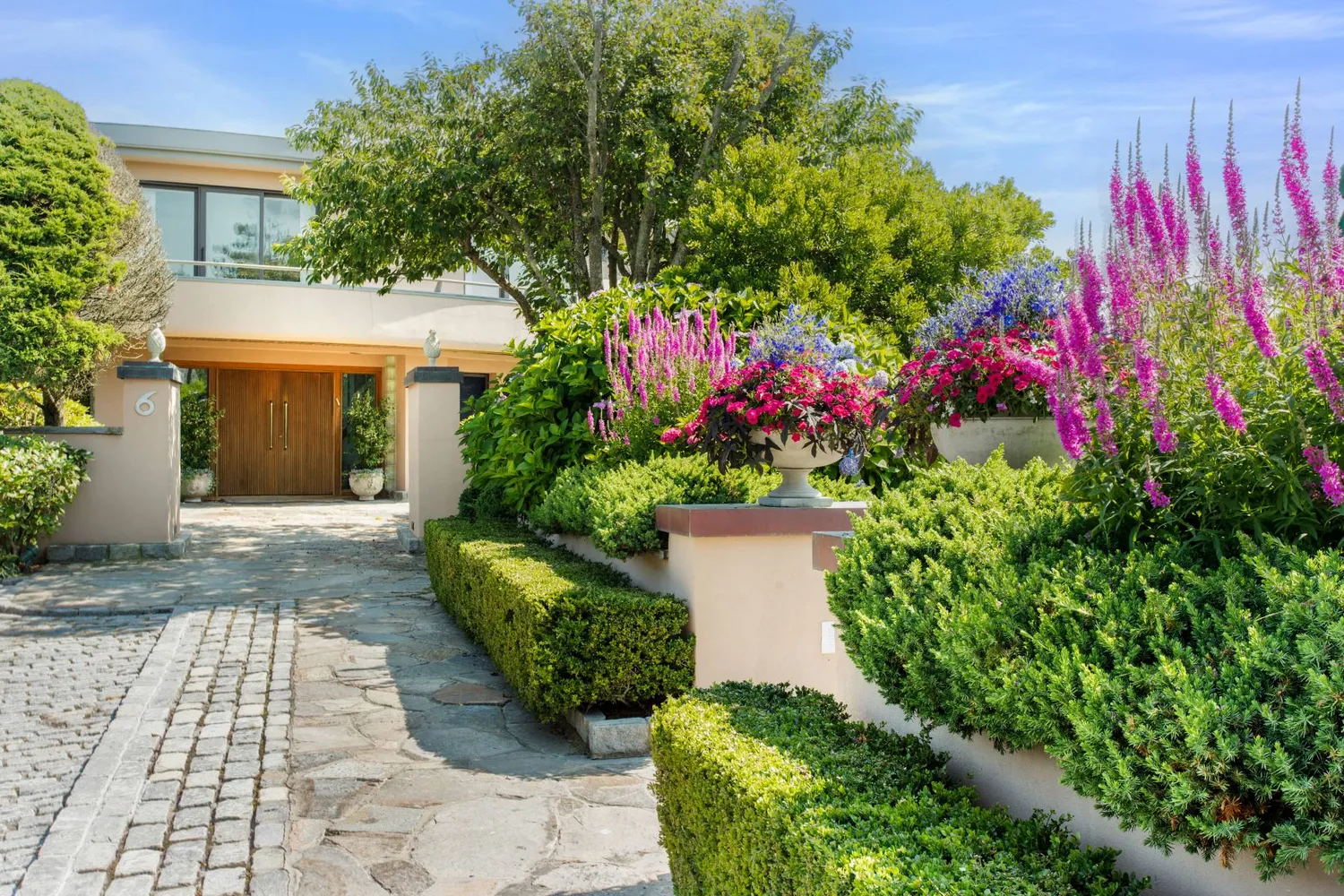 a view of a garden with flowers and flowers