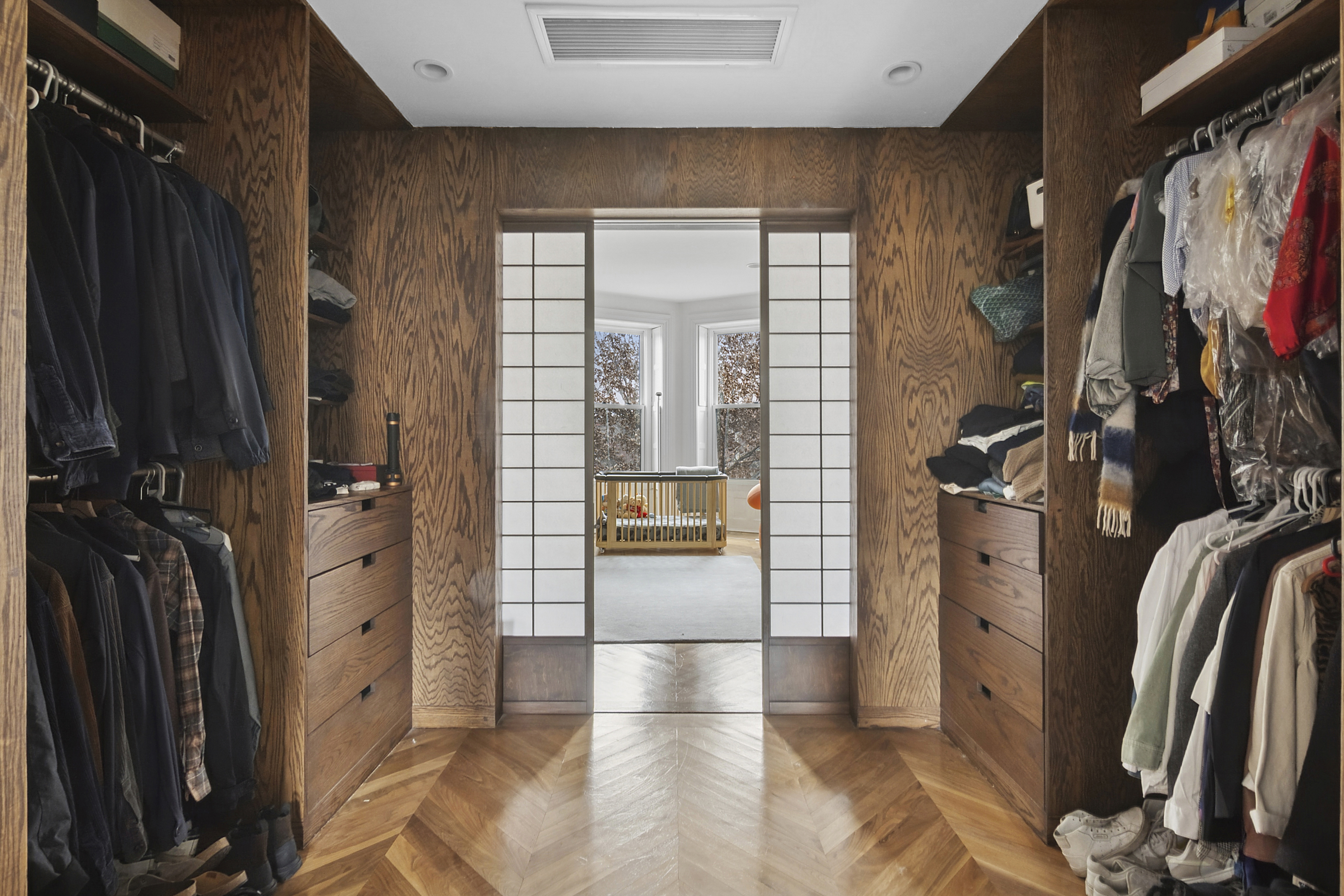 581 Greene Avenue, Unit 2 Brooklyn, NY 11216 - Photo 7 of 16 a view of walk in closet with clothes and shoes