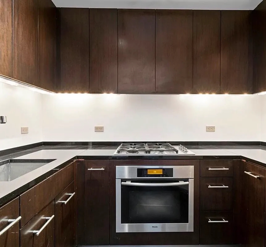 40 Broad Street, Unit 25C Manhattan, NY 10004 - Photo 4 of 10 a view of open kitchen