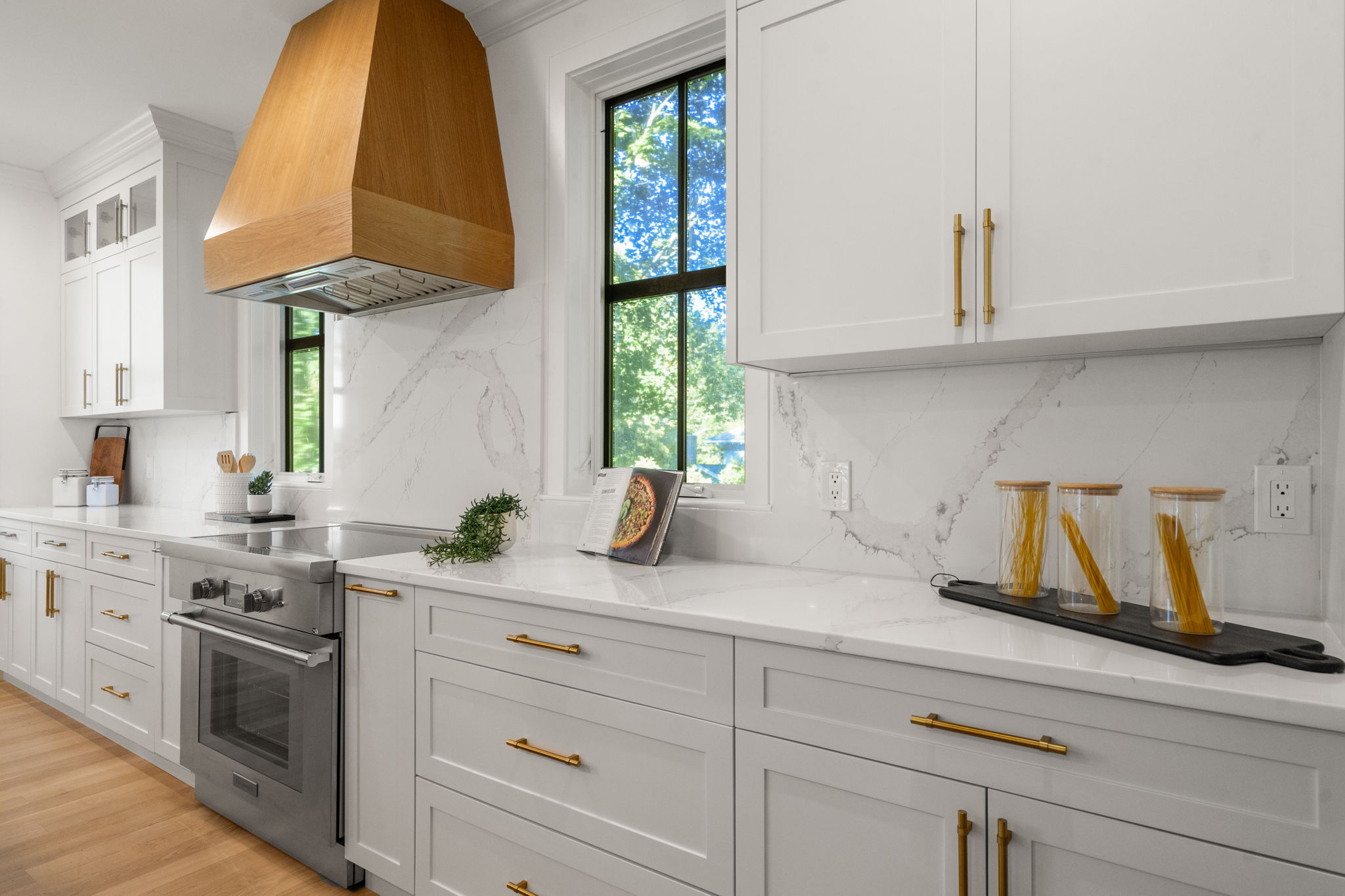 20 Oakland Street Wellesley, MA 02481 - Photo 6 of 30 a kitchen with white cabinets and appliances