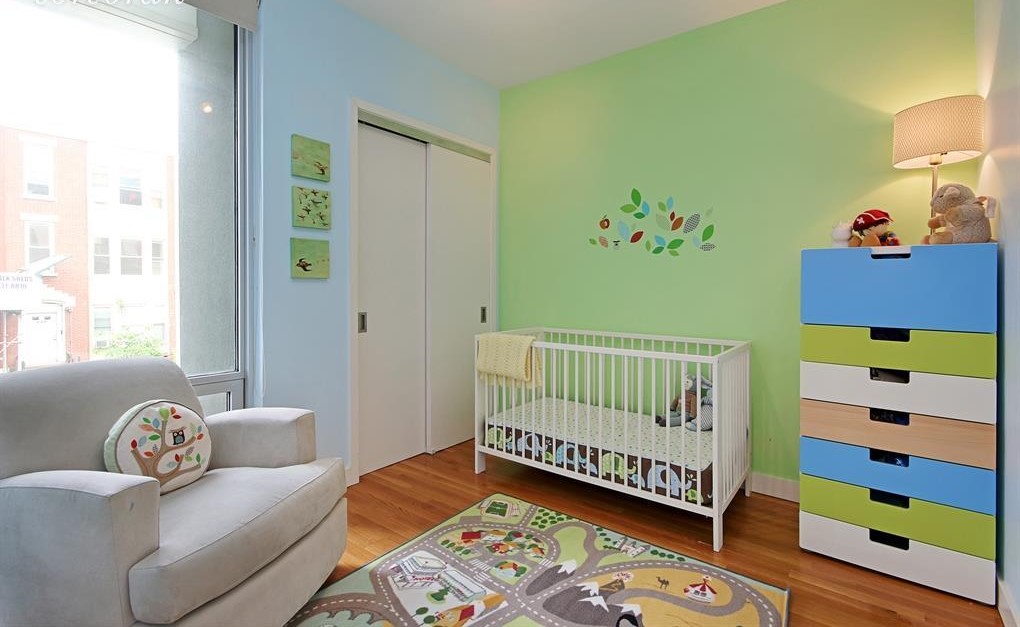 232 7th Street, Unit 2A Brooklyn, NY 11215 - Photo 5 of 8 a bedroom with a bed and a window