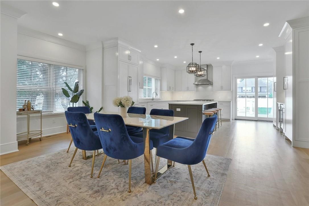 211 Purchase Street, Unit A Rye, NY 10580 - Photo 4 of 22 a view of a dining room with furniture window and wooden floor
