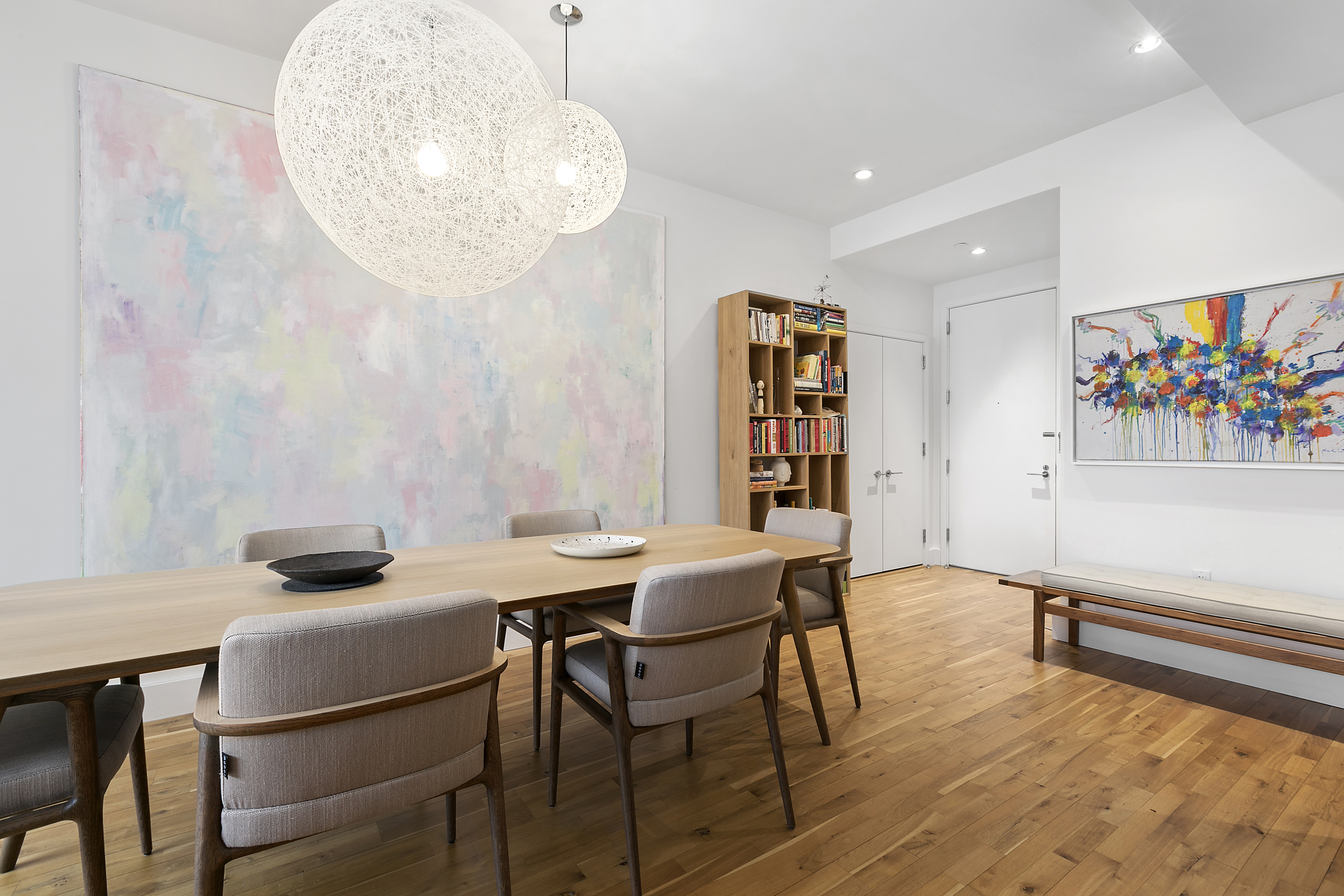 360 Furman Street, Unit 1120 Brooklyn, NY 11201 - Photo 6 of 43 a view of a dining room with furniture and wooden floor