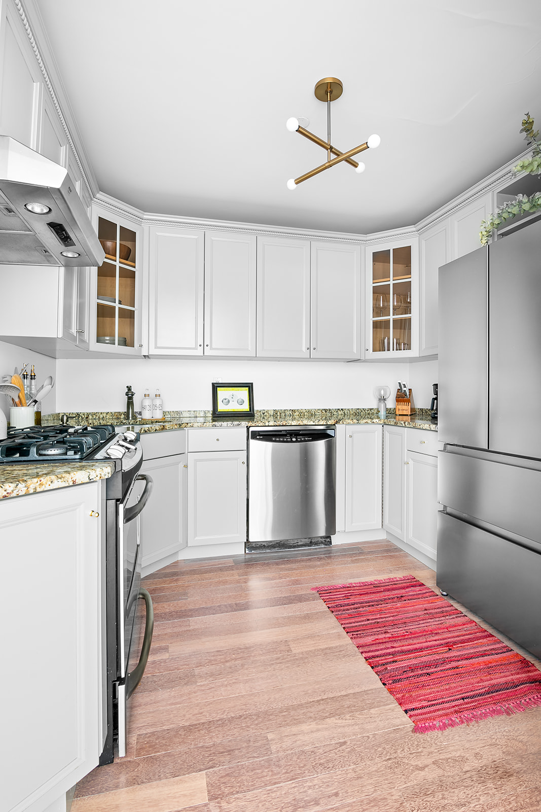 127 4th Place, Unit 2A Brooklyn, NY 11231 - Photo 3 of 6 a kitchen with granite countertop stainless steel appliances a sink and cabinets