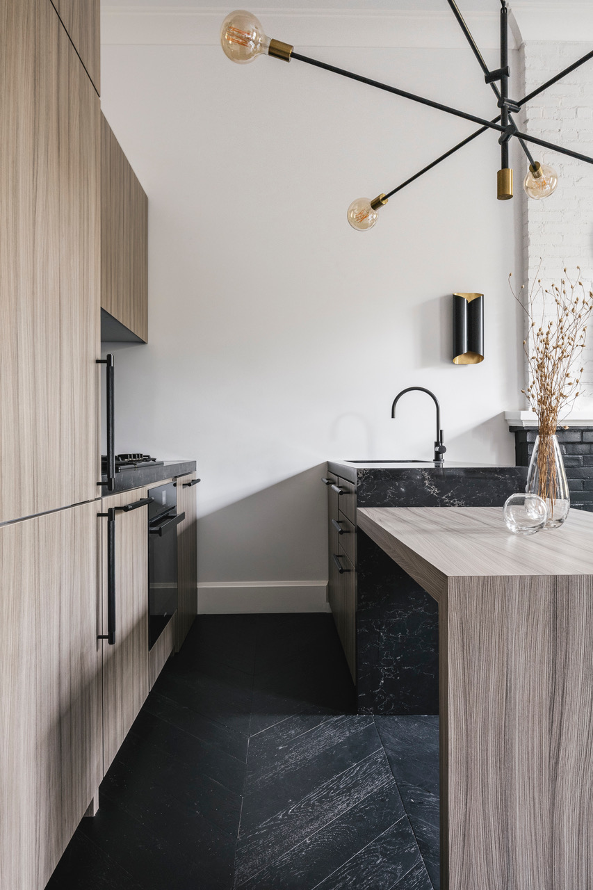 51 Morton Street, Unit 5D Manhattan, NY 10014 - Photo 7 of 17 a kitchen with a sink and a stove top oven