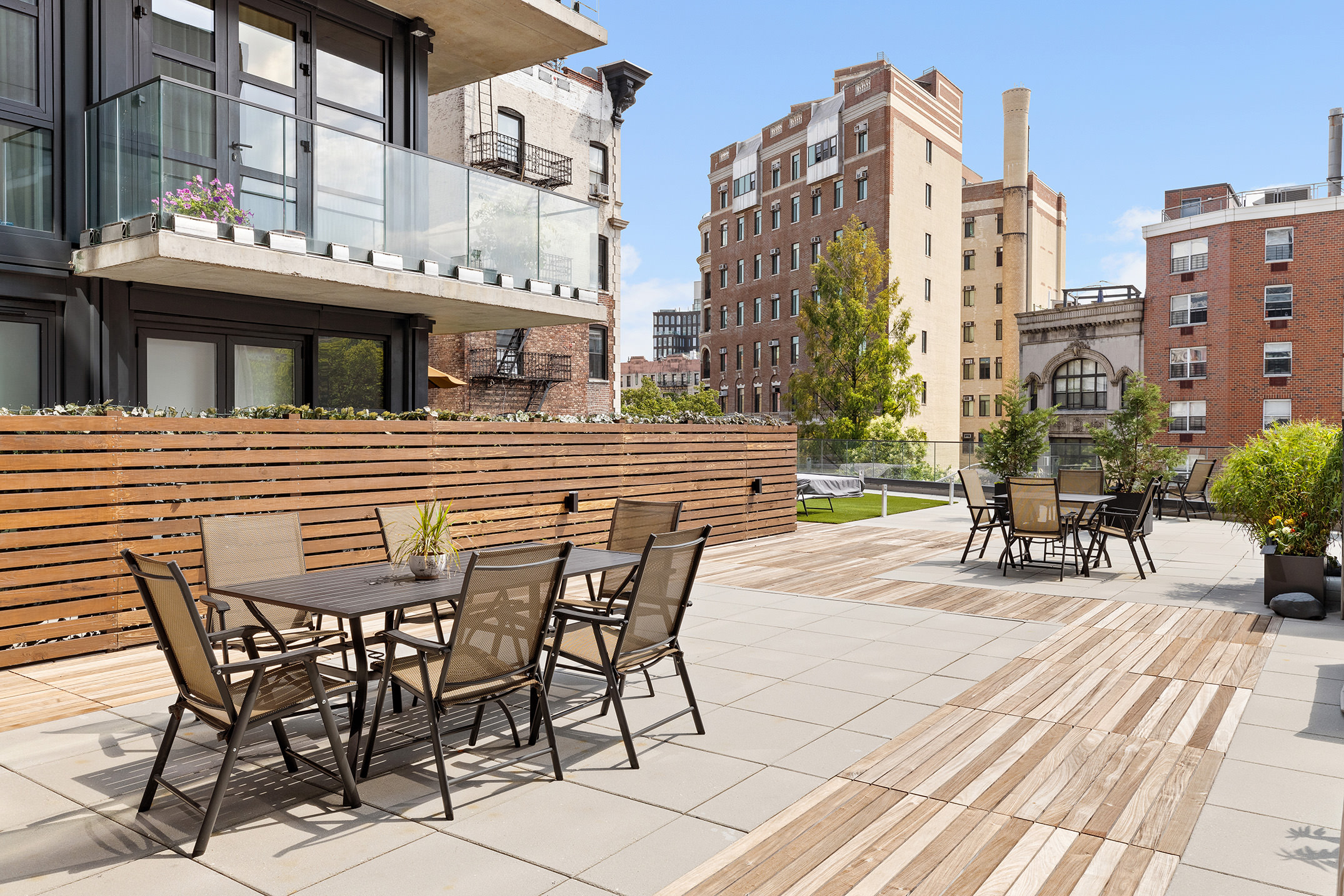 11 Hancock Place, Unit PH102 Manhattan, NY 10027 - Photo 13 of 18 a view of a patio with couches table and chairs
