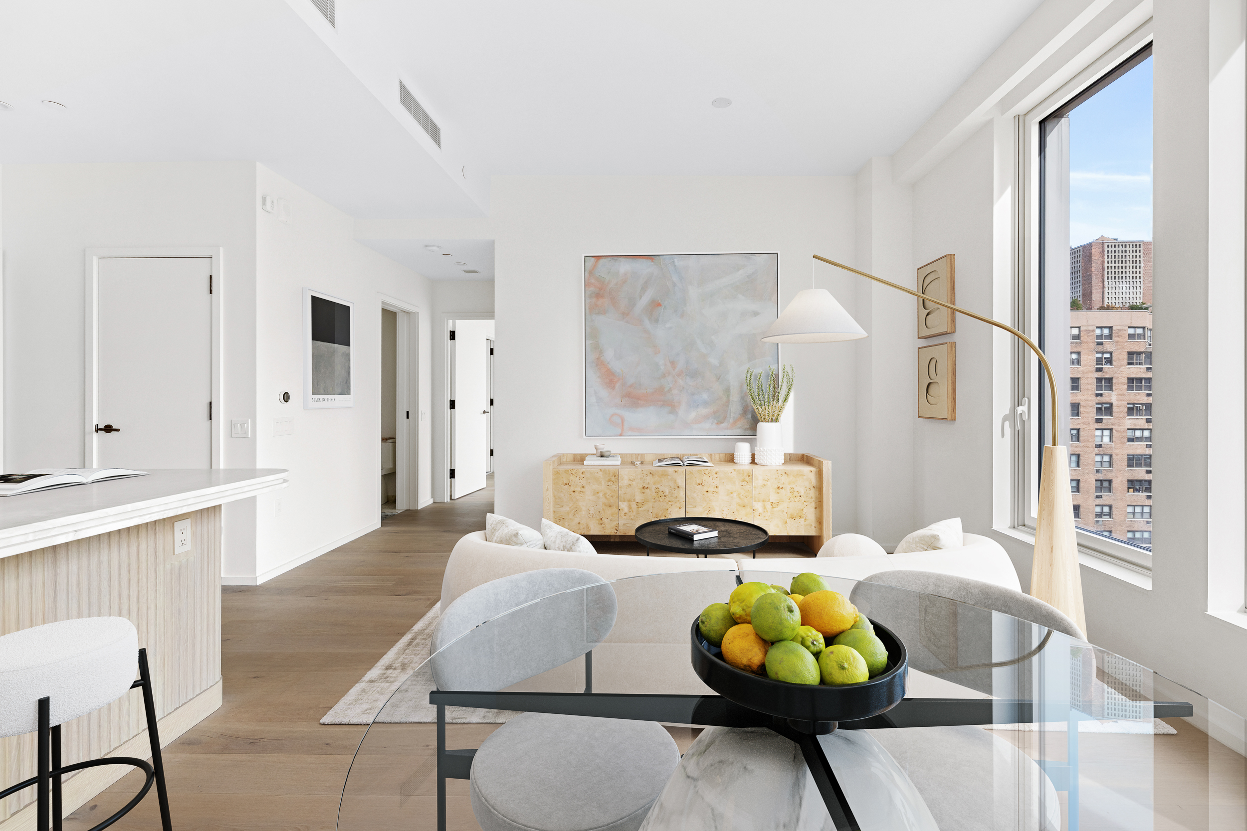249 East 62nd Street, Unit 10B Manhattan, NY 10065 - Photo 3 of 21 a living room with stainless steel appliances furniture and decor