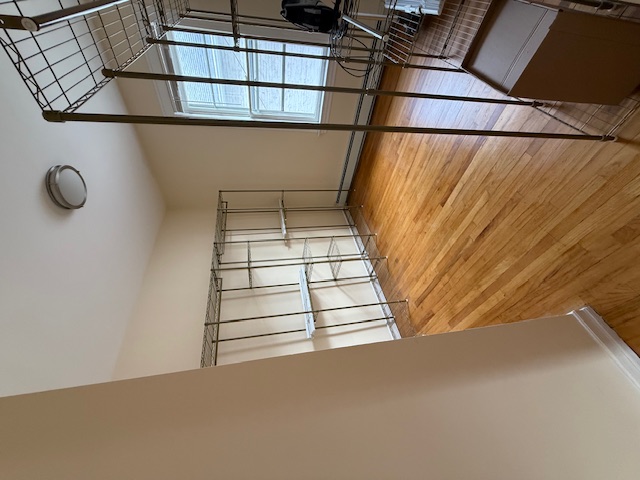 1587 East 18th Street, Unit 2 Brooklyn, NY 11230 - Photo 8 of 13 a view of an empty room with a window