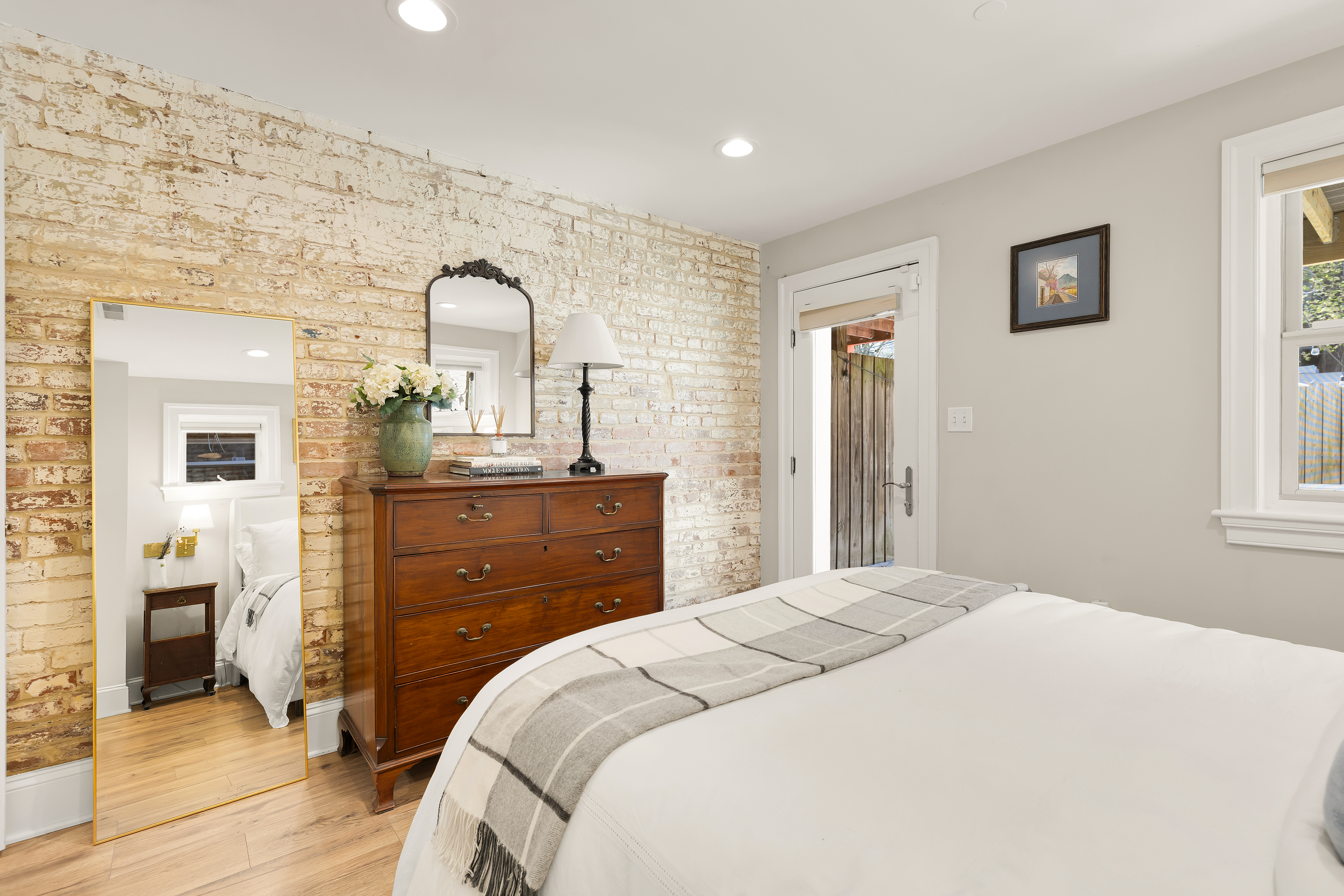 1354 Kenyon Street Northwest, Unit G Washington, DC 20010 - Photo 27 of 35 a bedroom with a bed and a dresser