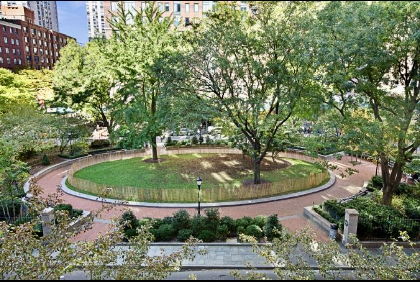 200 Rector Place, Unit 2C Manhattan, NY 10280 - Photo 17 of 19 a view of a garden with a fountain