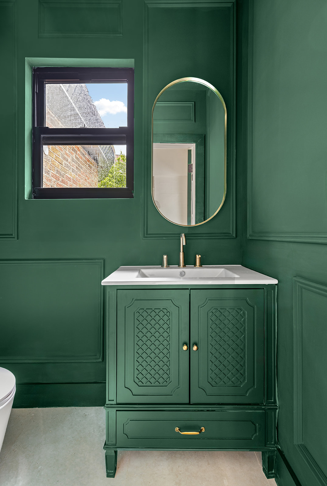 697 East 21st Street Brooklyn, NY 11210 - Photo 7 of 18 a bathroom with a sink mirror and toilet