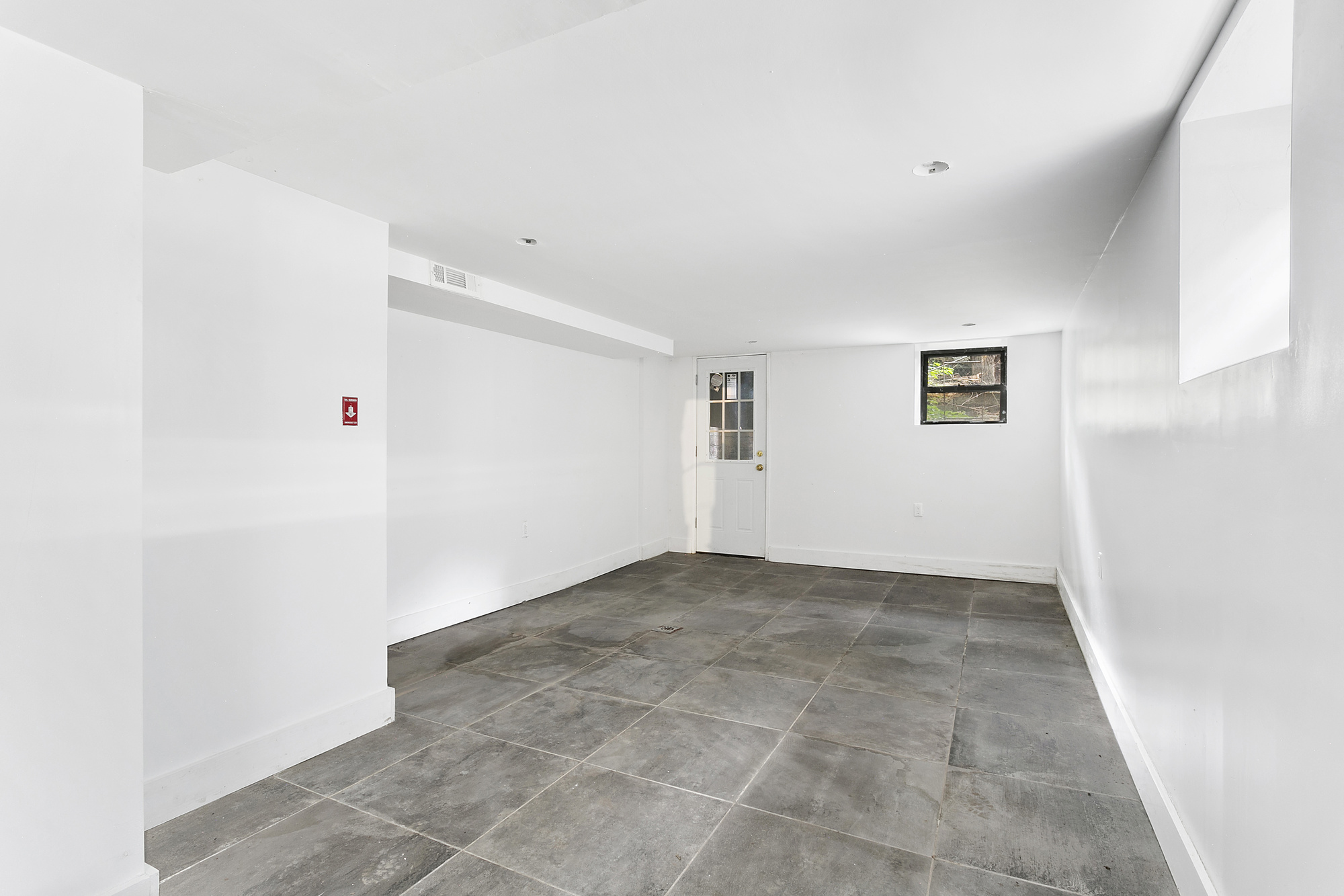 342 East 9th Street Brooklyn, NY 11218 - Photo 10 of 12 a view of an empty room