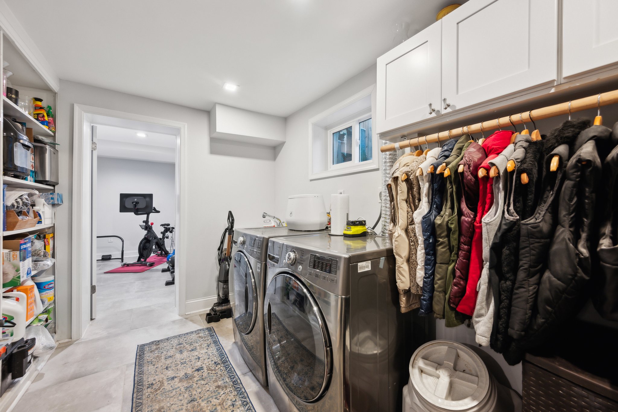 2607 Ross Road Chevy Chase, MD 20815 - Photo 32 of 37 a view of walk in closet with clothes and shoes