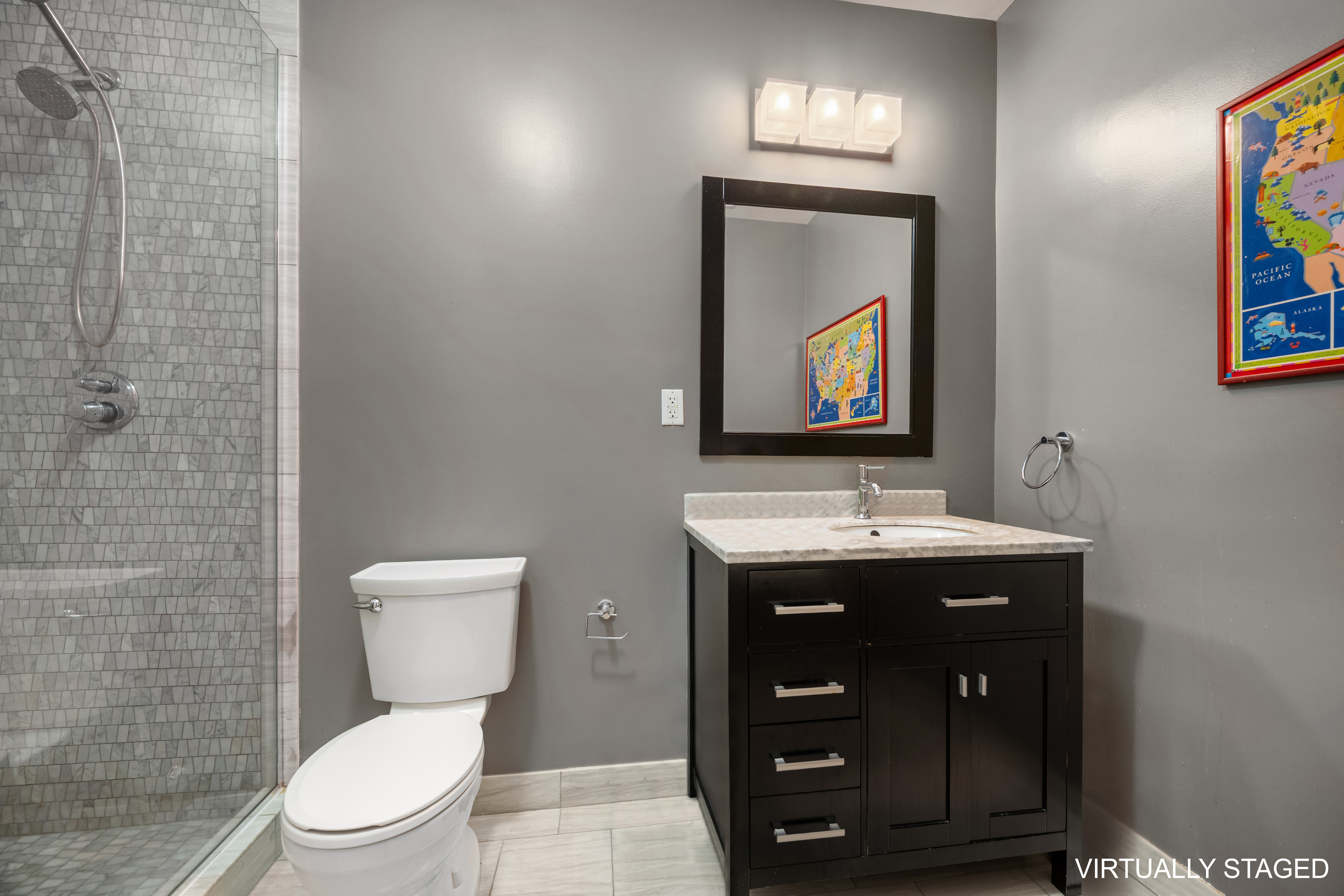 273 Lenox Avenue Manhattan, NY 10027 - Photo 7 of 15 a bathroom with a toilet a sink and mirror