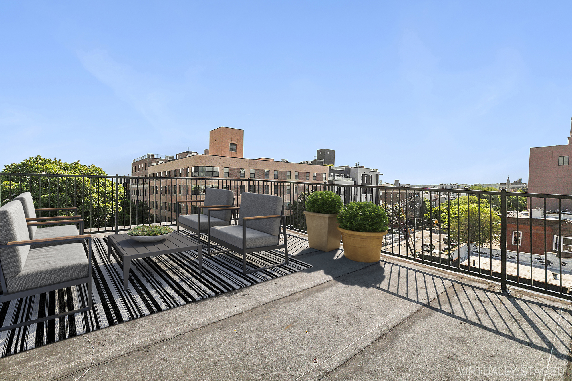 866 Bushwick Avenue, Unit 2 Brooklyn, NY 11221 - Photo 10 of 12 a view of a roof deck with couches