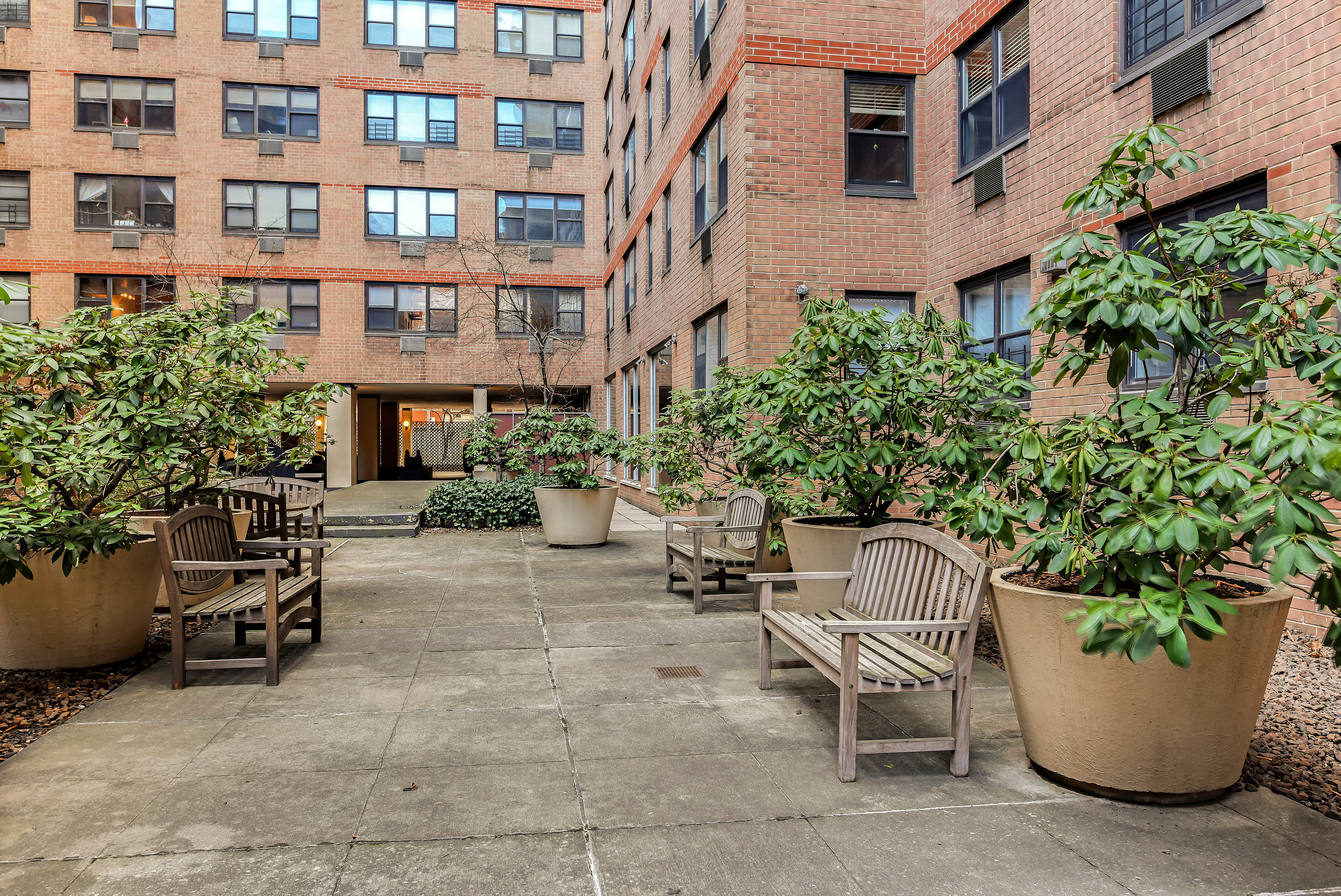 333 East 79th Street, Unit 1R Manhattan, NY 10075 - Photo 9 of 12 a view of a patio with plants and chairs and plants