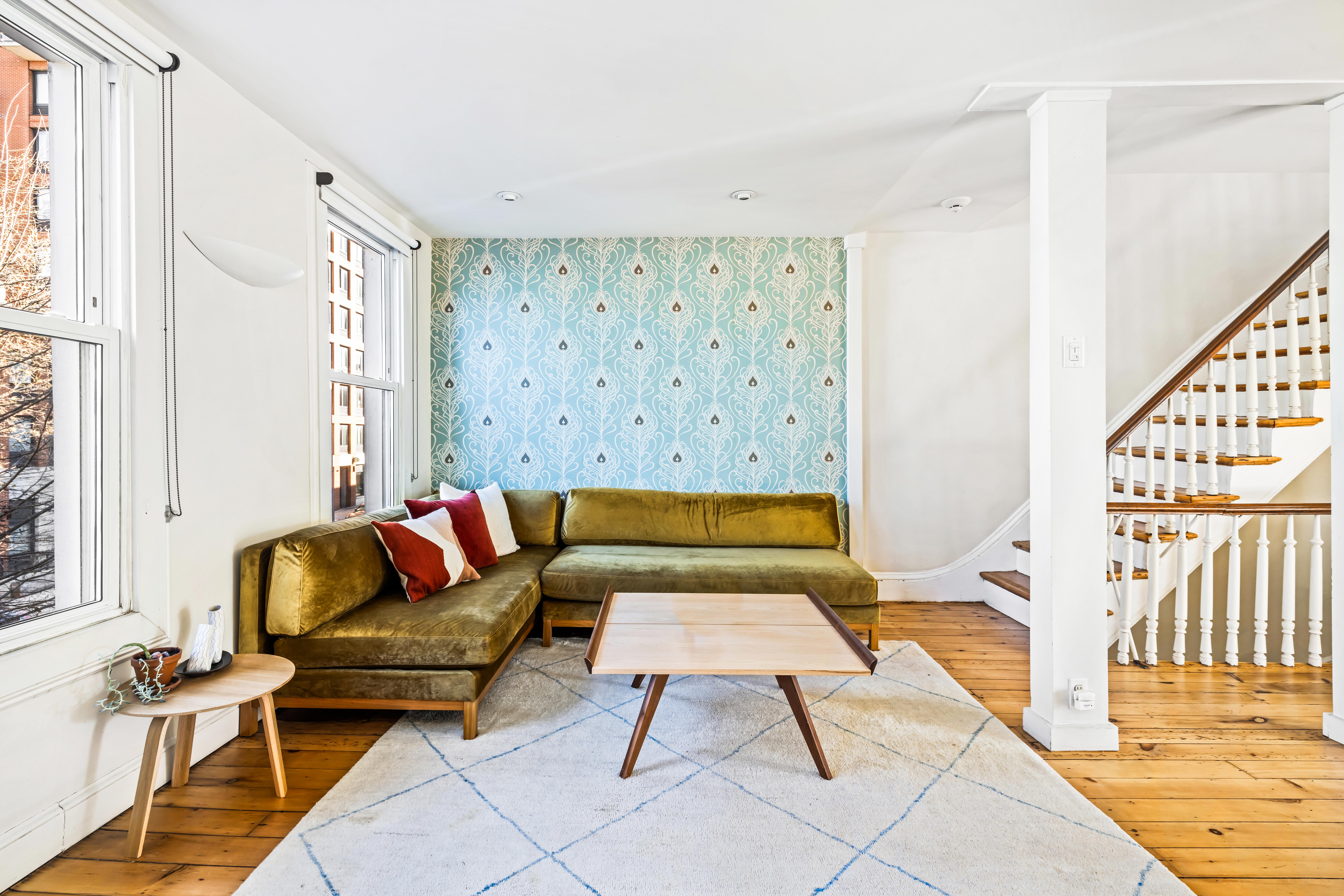 226 11th Street, Unit 2 Brooklyn, NY 11215 - Photo 6 of 19 a living room with furniture and a rug