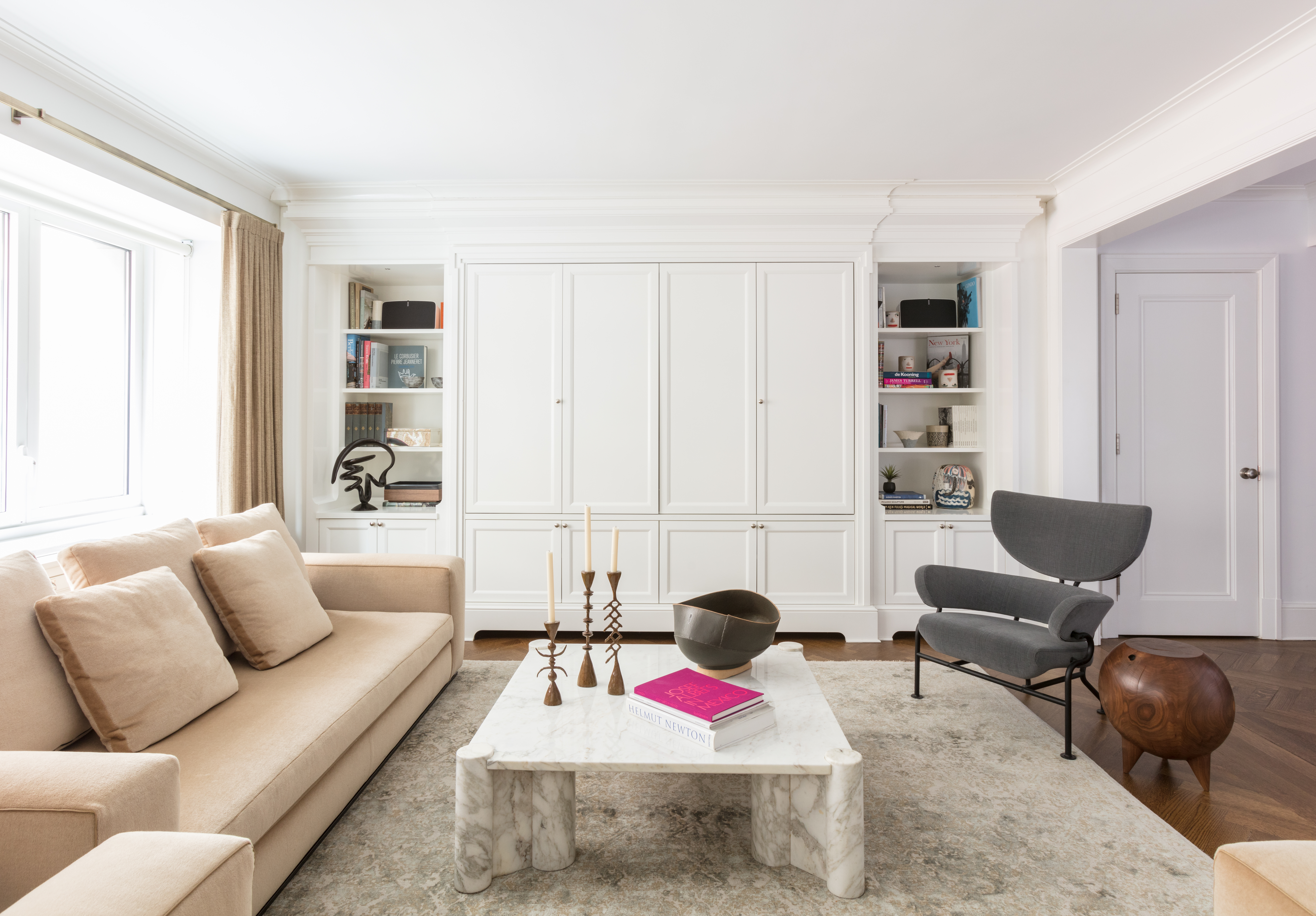a living room with furniture and a rug