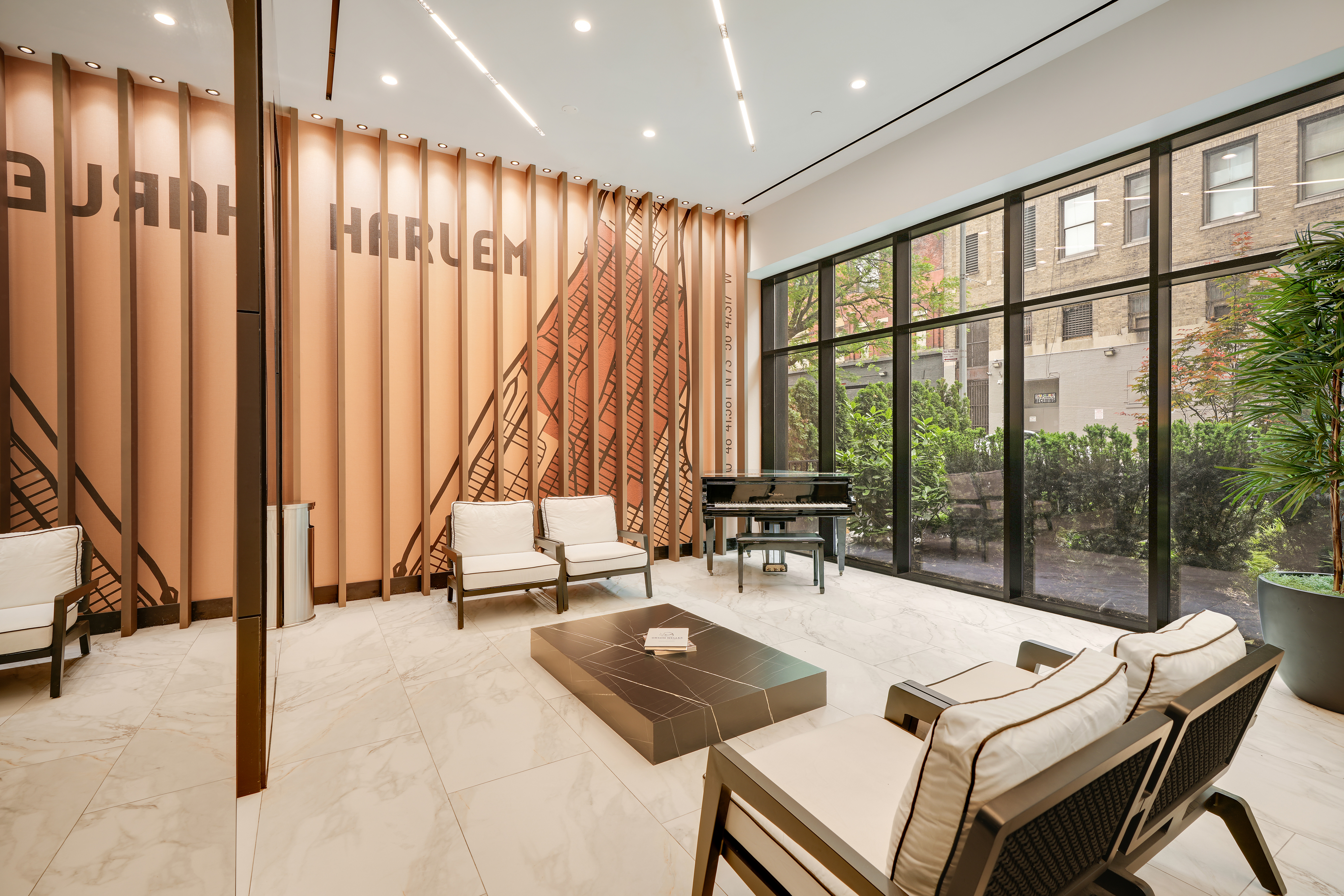 224 West 124th Street, Unit 305 Manhattan, NY 10027 - Photo 12 of 23 a living room with furniture and a large window