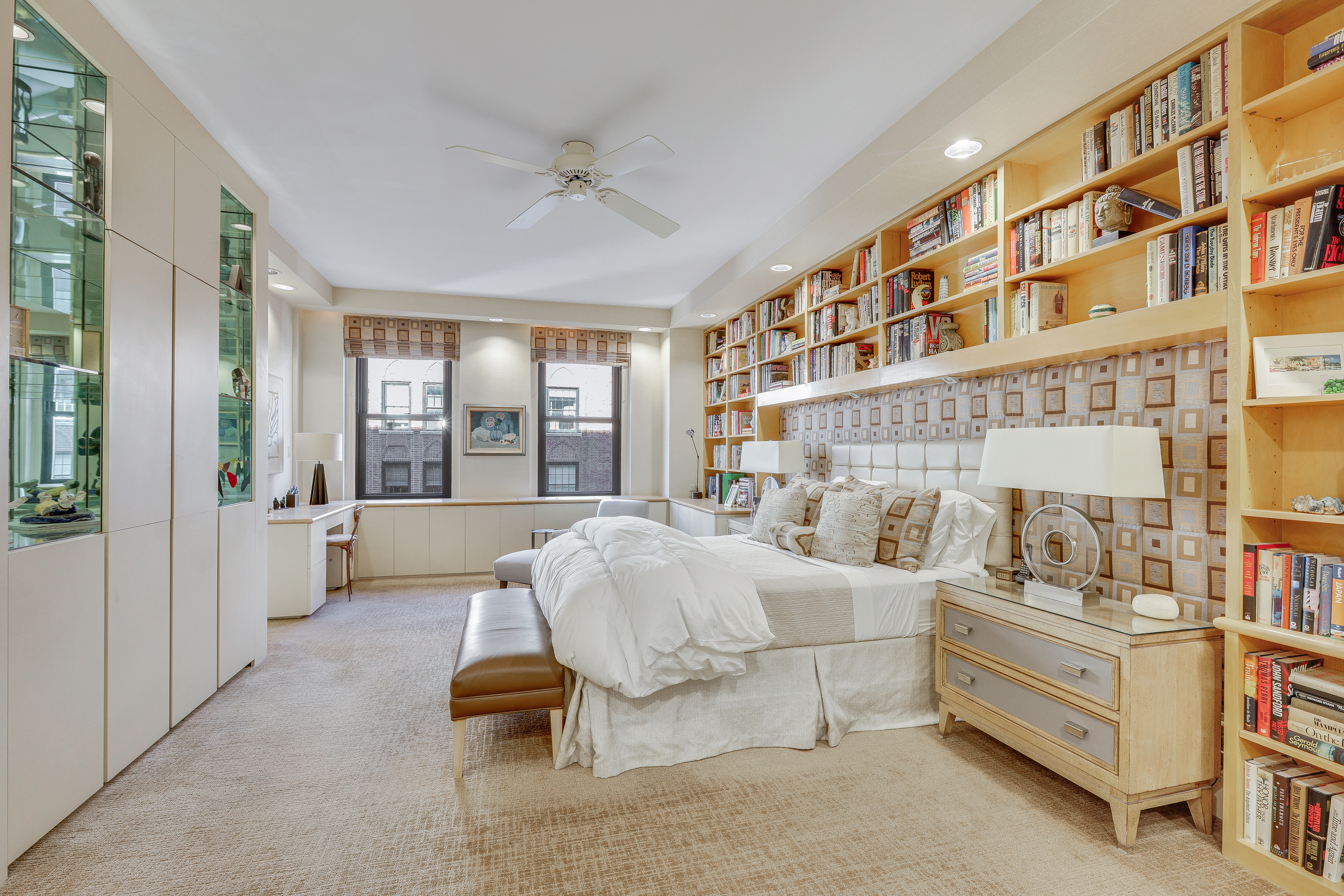 1175 Park Avenue, Unit 13B Manhattan, NY 10128 - Photo 3 of 12 a living room with furniture and a floor to ceiling window