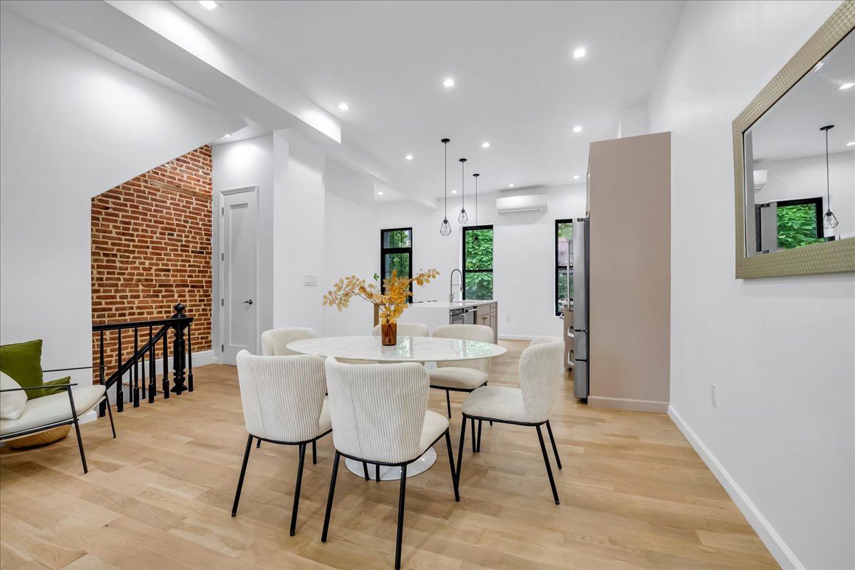 448 Halsey Street, Unit 1 Brooklyn, NY 11233 - Photo 6 of 22 a view of a dining room with furniture