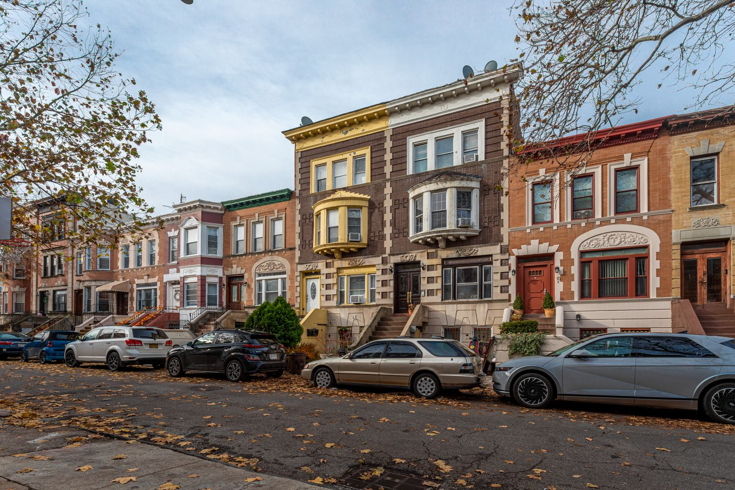 12 Virginia Place Brooklyn, NY 11213 - Photo 10 of 10 a car parked in front of a white house