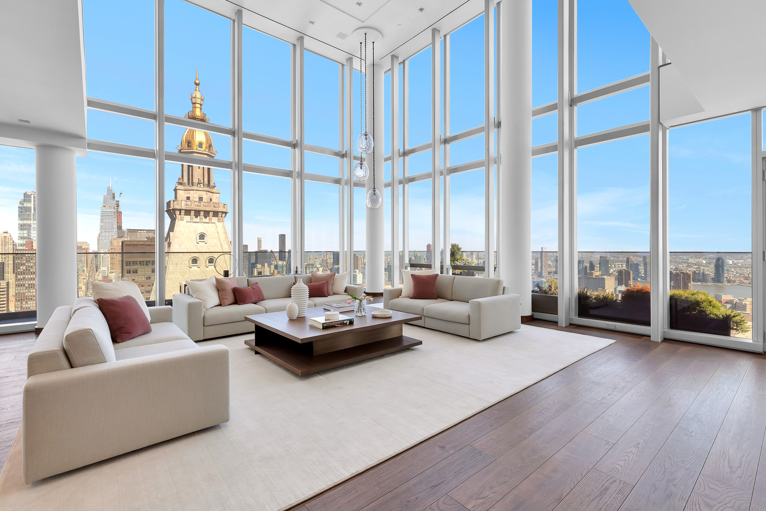 23 East 22nd Street, Unit PH Manhattan, NY 10010 - Photo 3 of 32 a living room with furniture and a large window