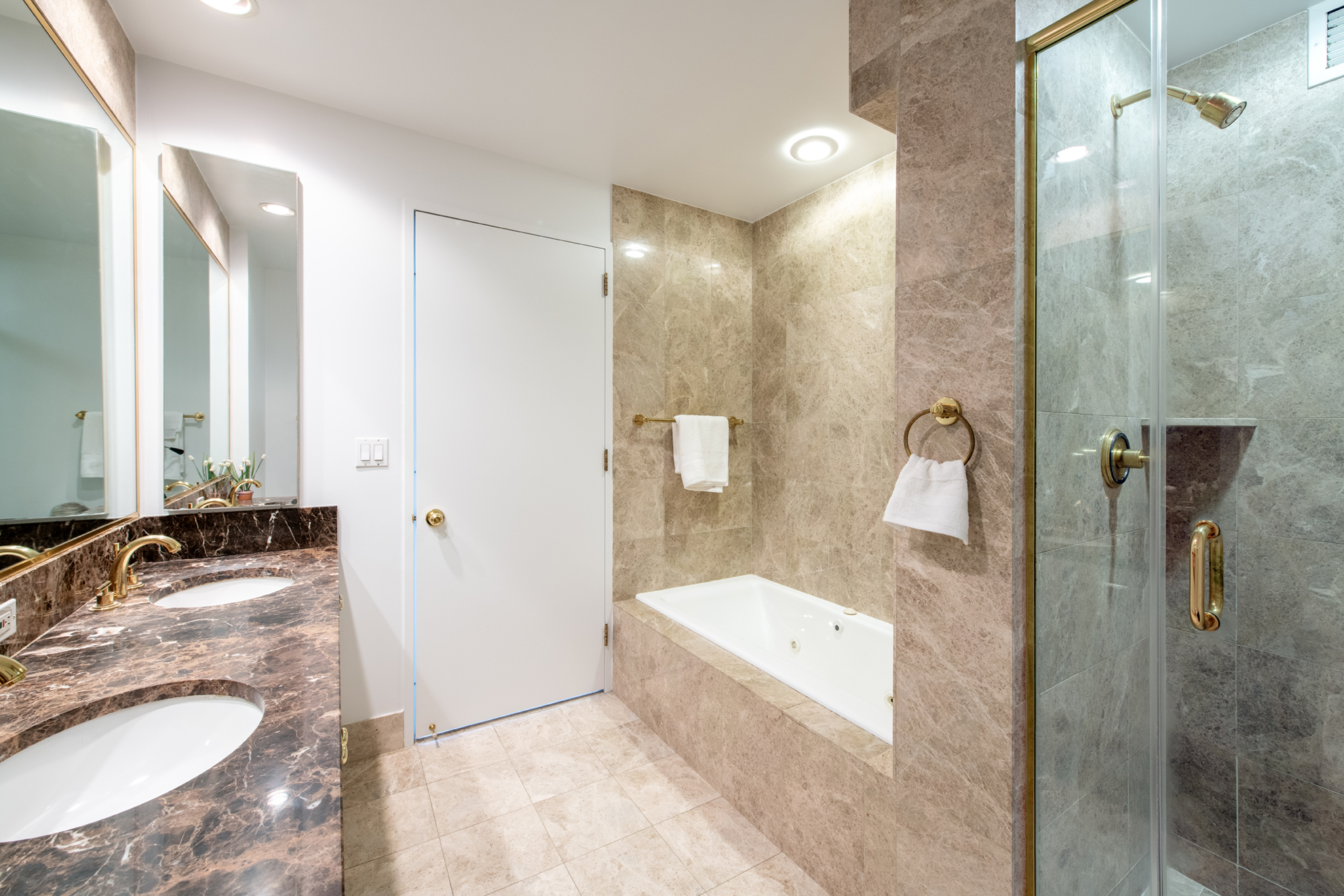 220 Riverside Boulevard, Unit 9K Manhattan, NY 10069 - Photo 6 of 8 a bathroom with a sink and a mirror