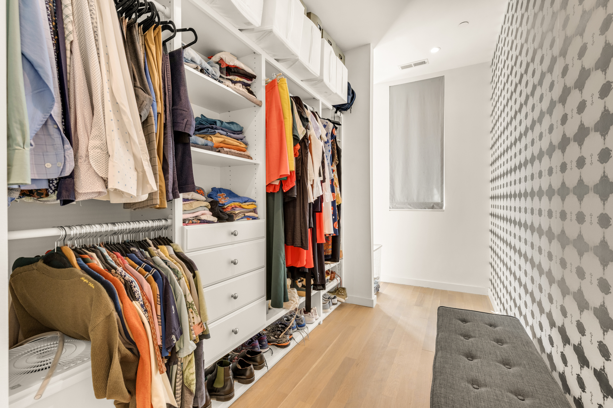 1501 4th Street Northwest, Unit 1 Washington, DC 20001 - Photo 31 of 41 a view of walk in closet with clothes and shoes