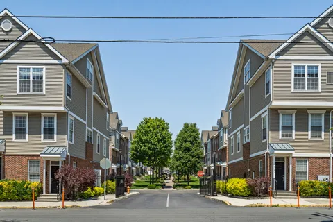 a front view of a building and a street