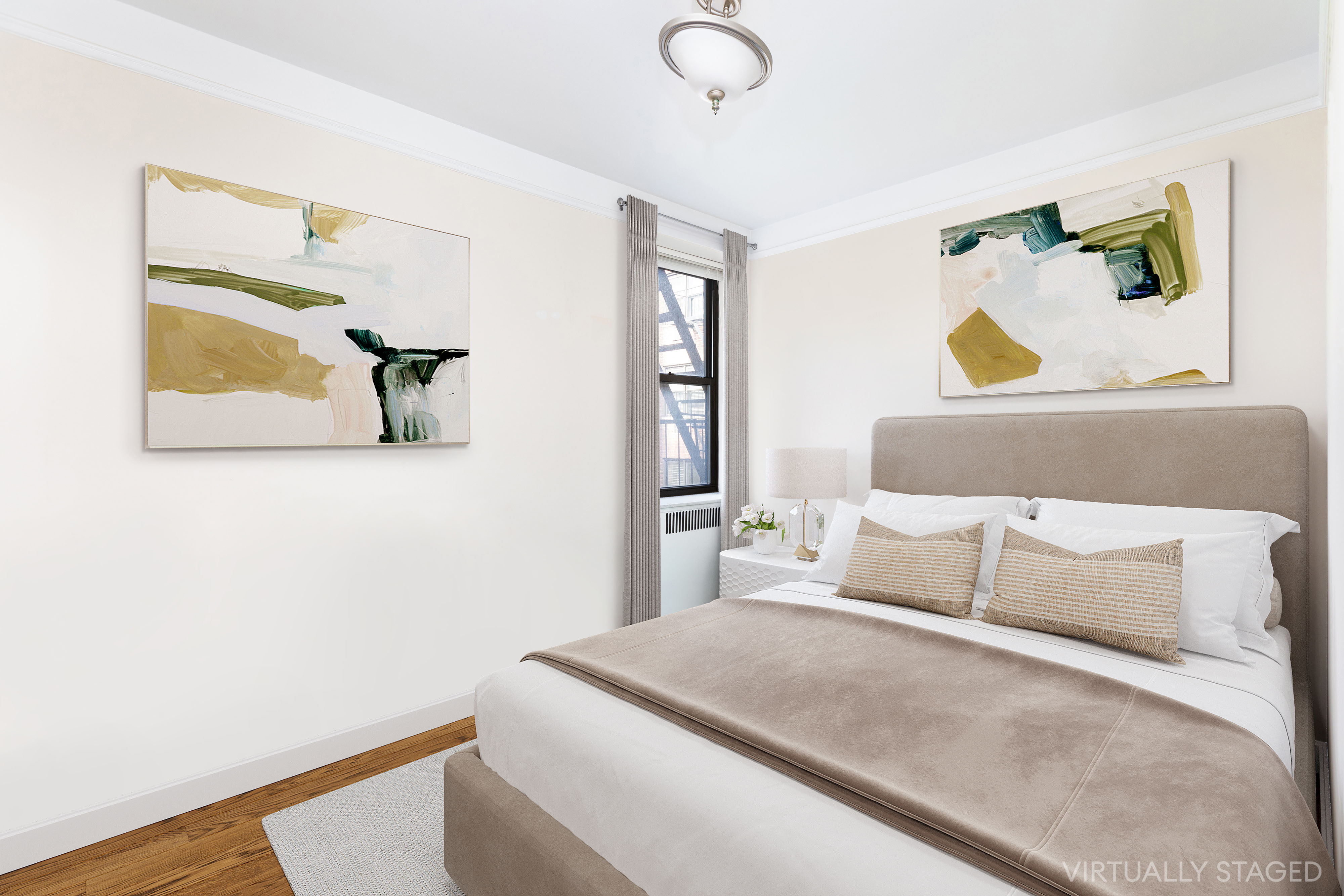 402 East 74th Street, Unit 4B Manhattan, NY 10021 - Photo 4 of 9 a bedroom with a bed and a painting on the wall