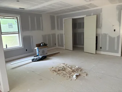 an empty room with windows