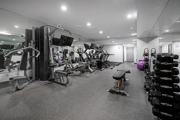 341 Eastern Parkway, Unit 5E Brooklyn, NY 11216 - Photo 6 of 8 a view of a room with gym equipment