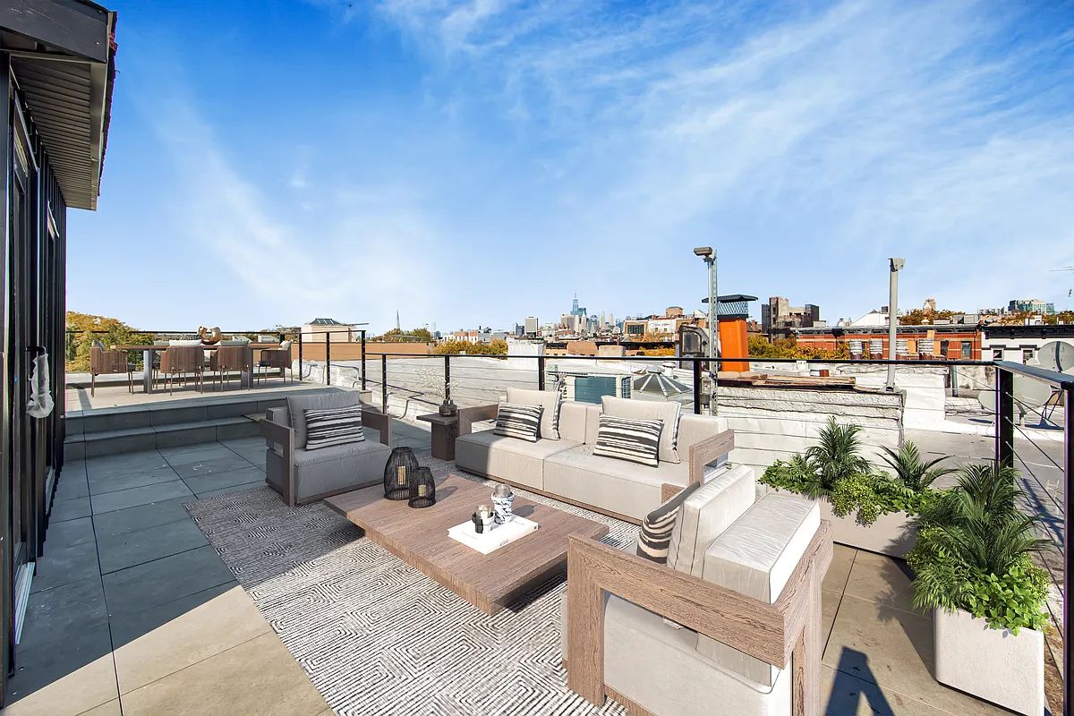 a view of roof deck with seating space and barbeque oven