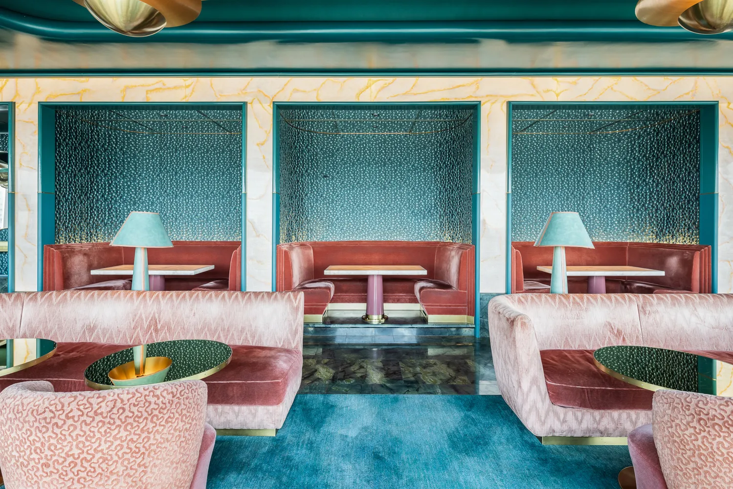 a room with furniture and a potted plant