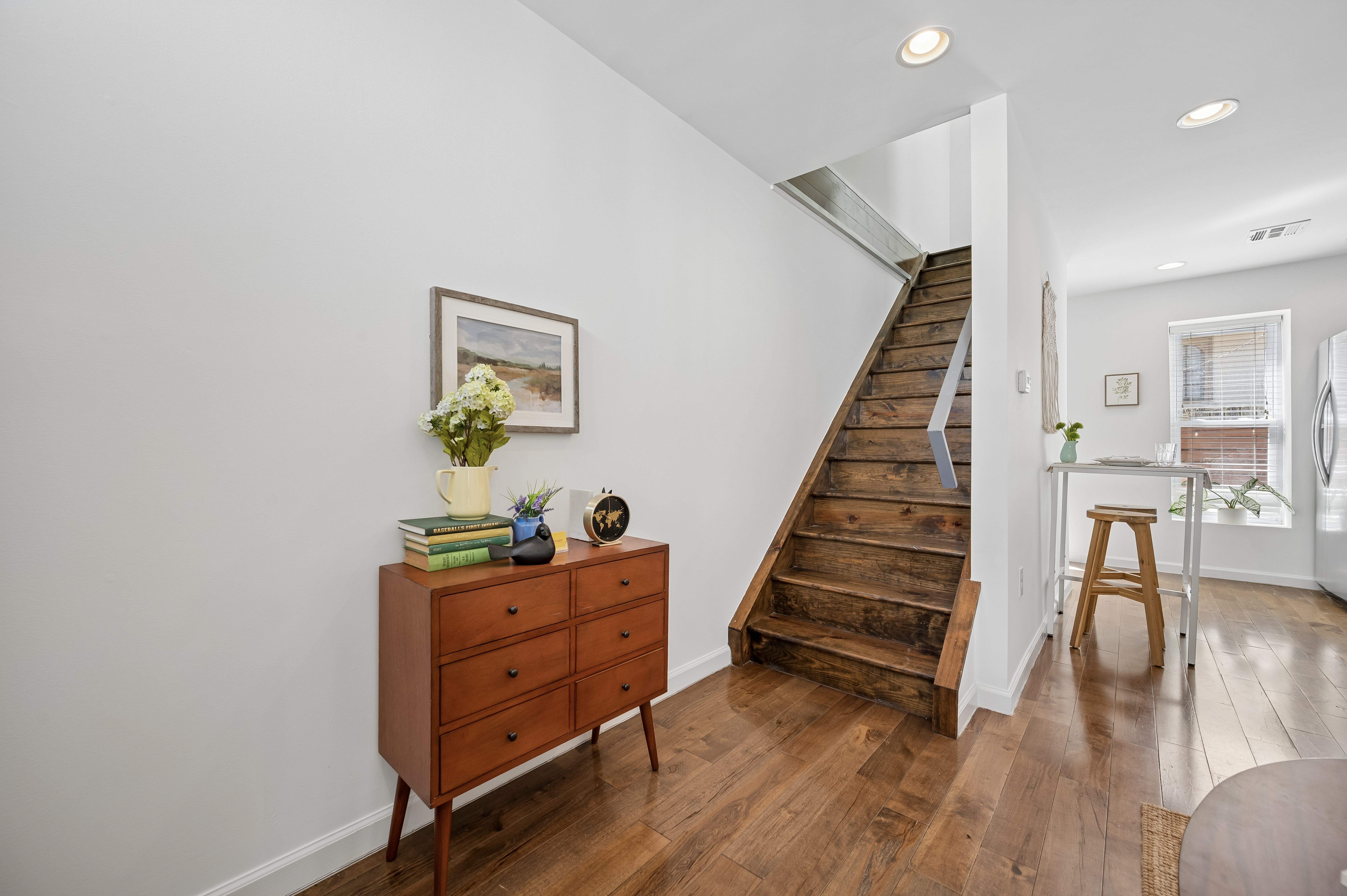 2420 Manning Street Philadelphia, PA 19103 - Photo 3 of 25 a room with wooden floors and stairs