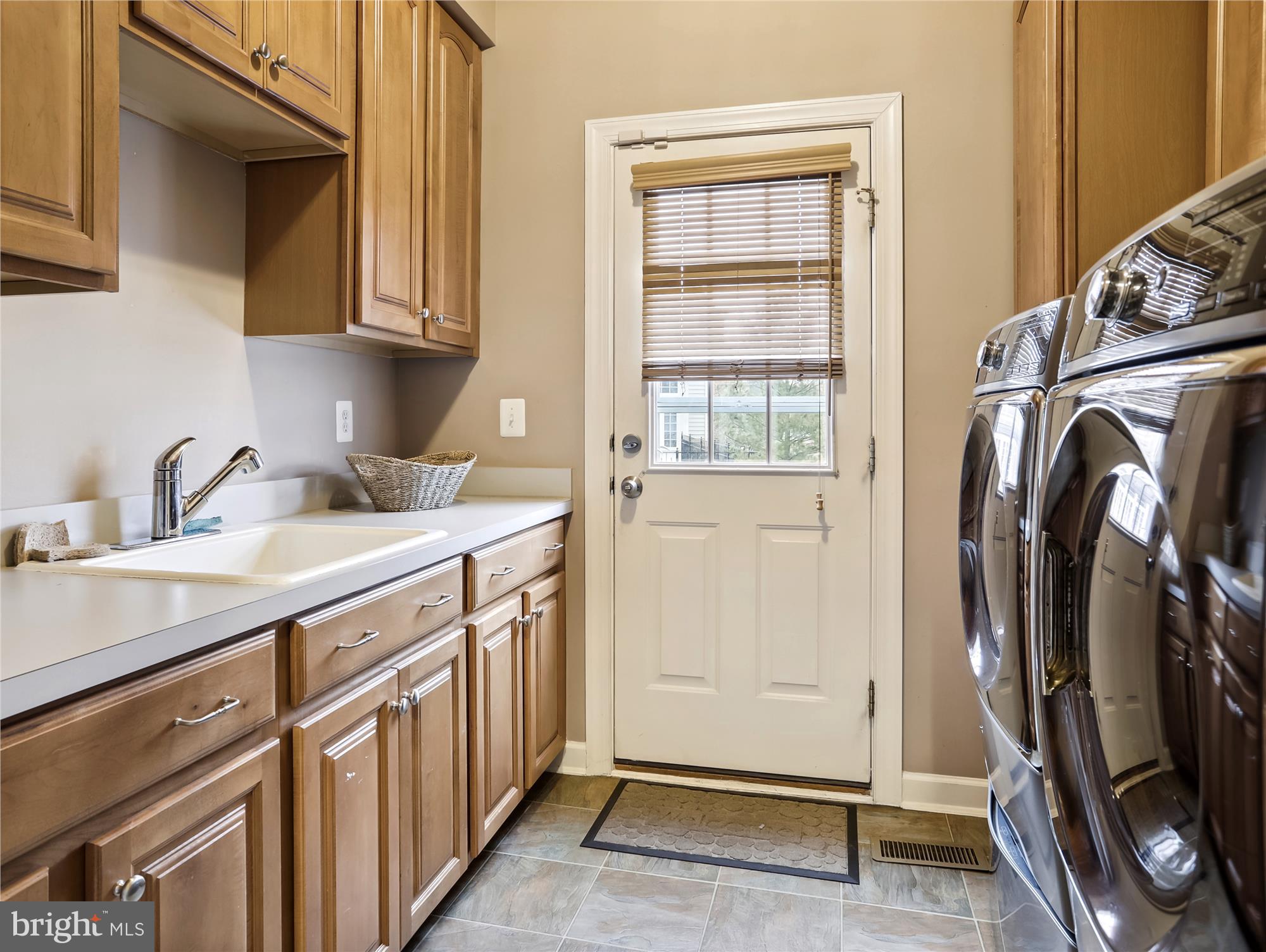 14302 Derby Ridge Road Bowie, MD 20721 - Photo 33 of 67 a view of a storage and utility room with a sink