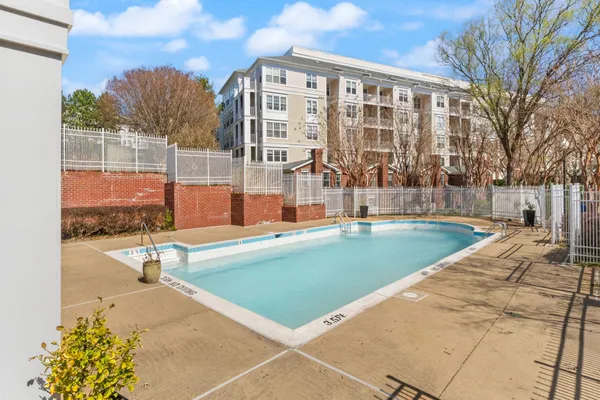 a view of a house with swimming pool