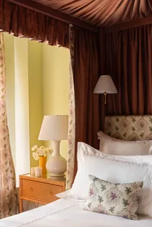 a living room with a couch and a table