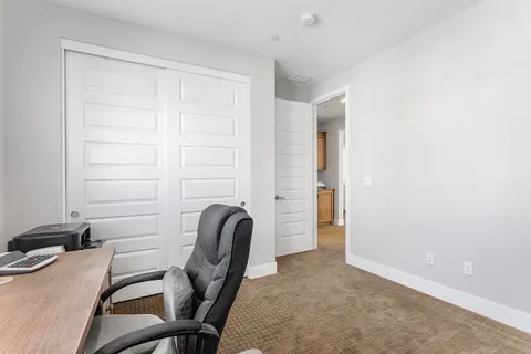 a living room with furniture and a couch