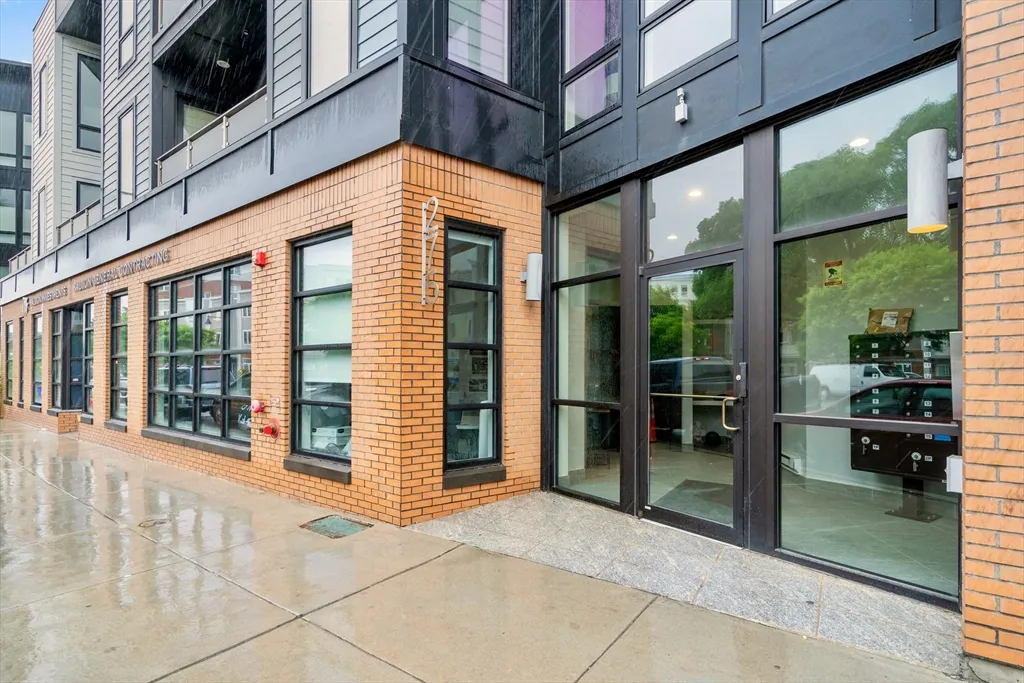 a view of entrance with a building and stairs