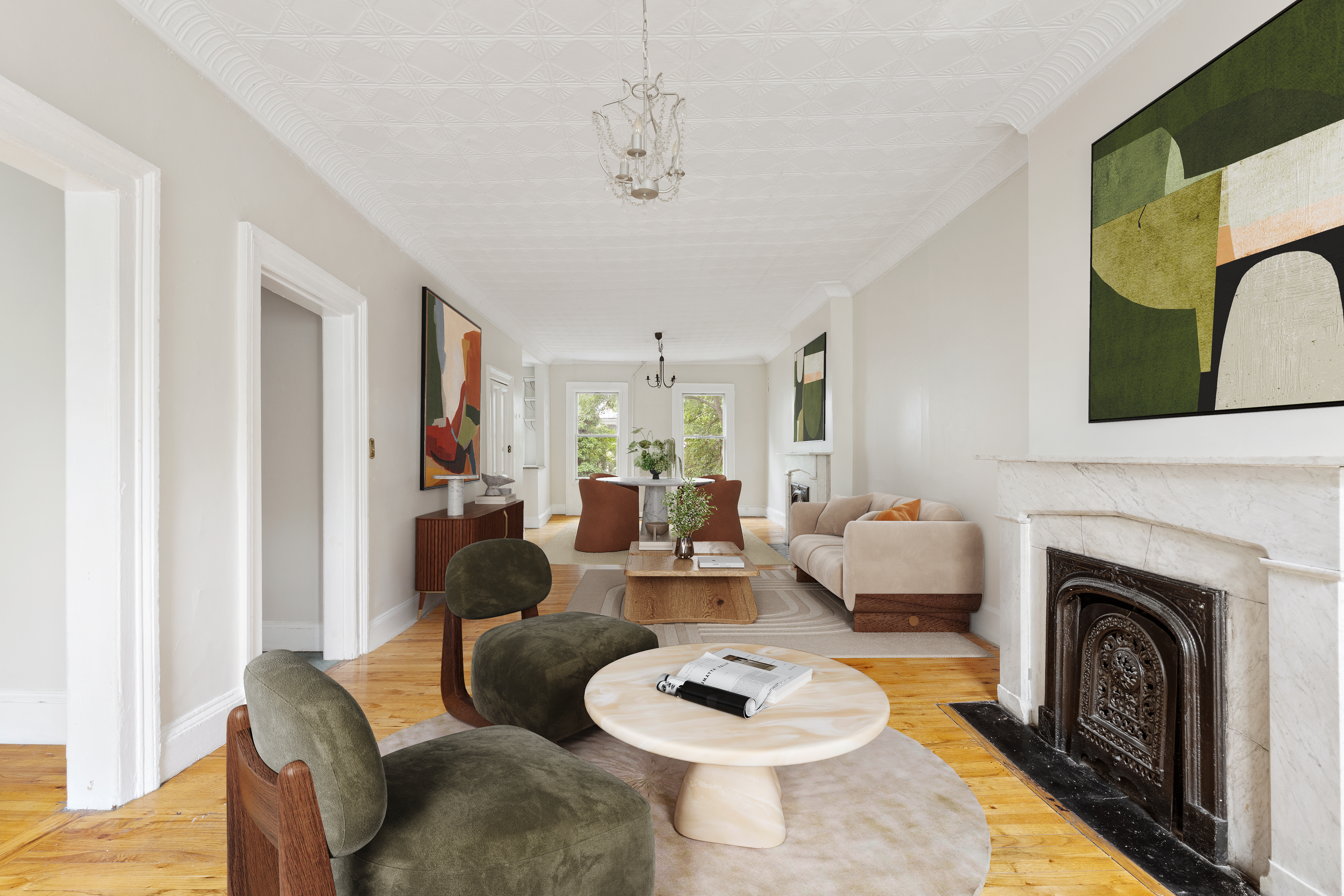 a living room with furniture and a fireplace