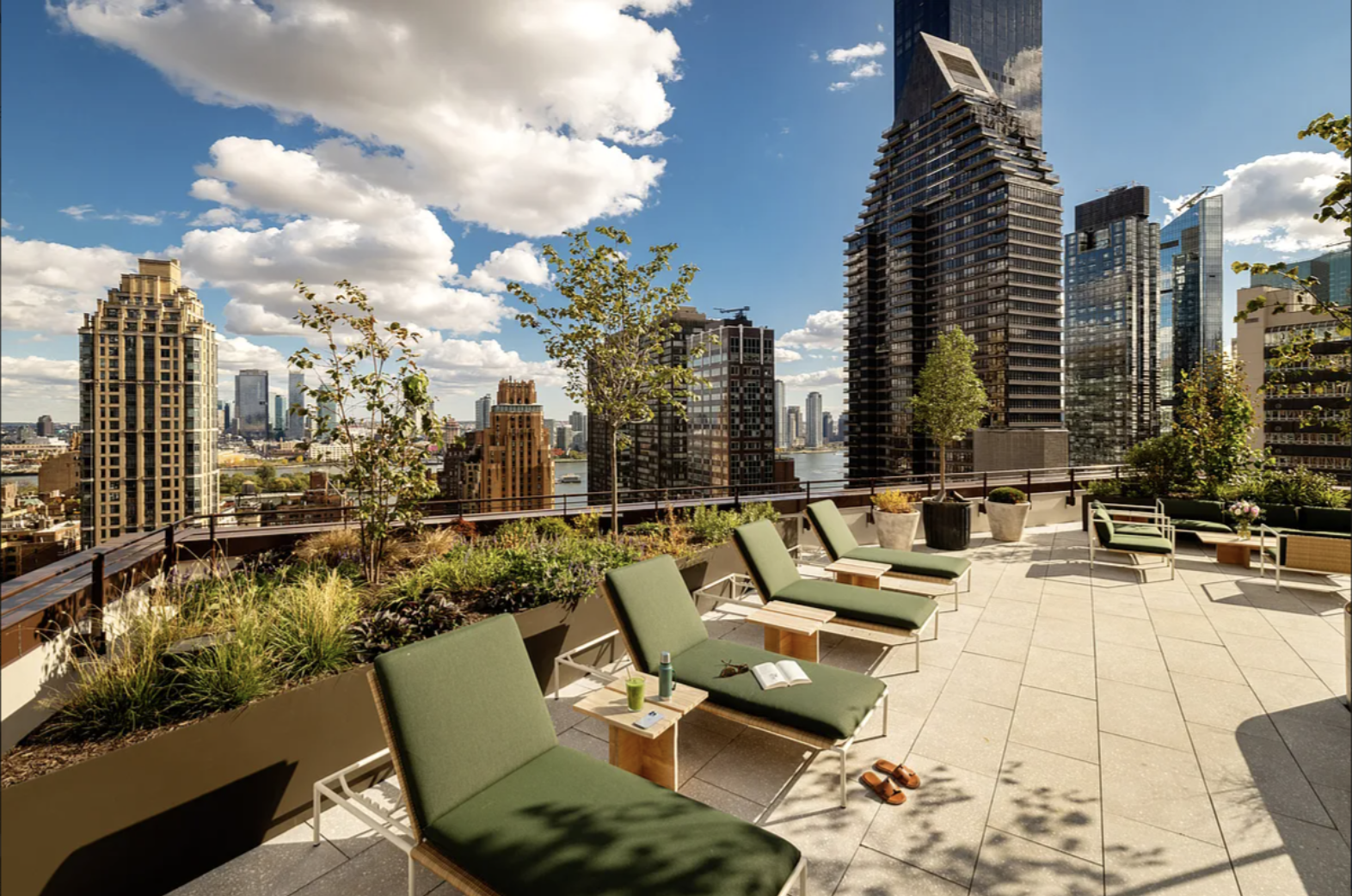 300 East 50th Street, Unit 18A Manhattan, NY 10022 - Photo 26 of 27 a view of swimming pool with outdoor seating and city view