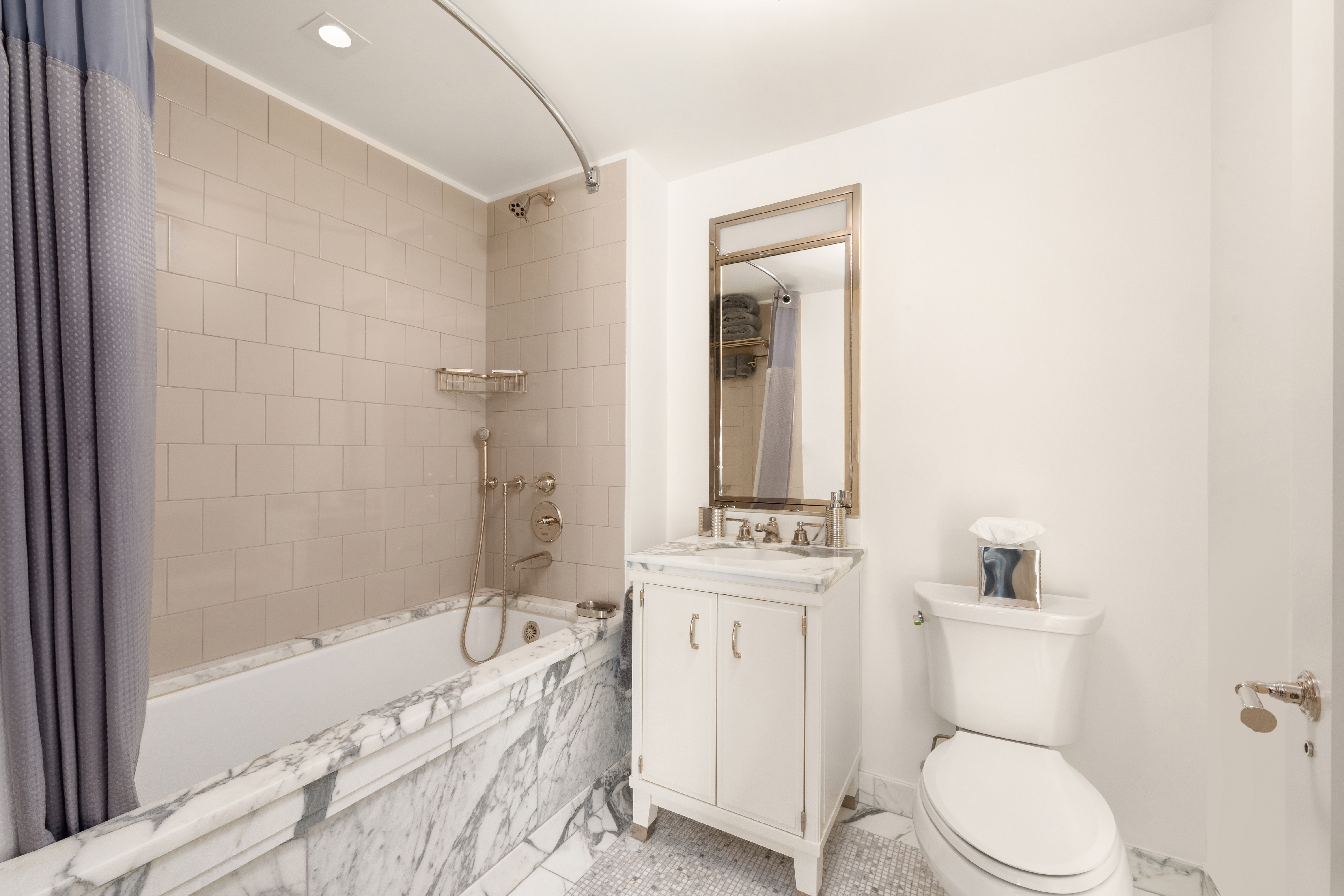 150 West 12th Street, Unit 3WEST Manhattan, NY 10011 - Photo 34 of 39 a bathroom with a toilet a sink and bathtub