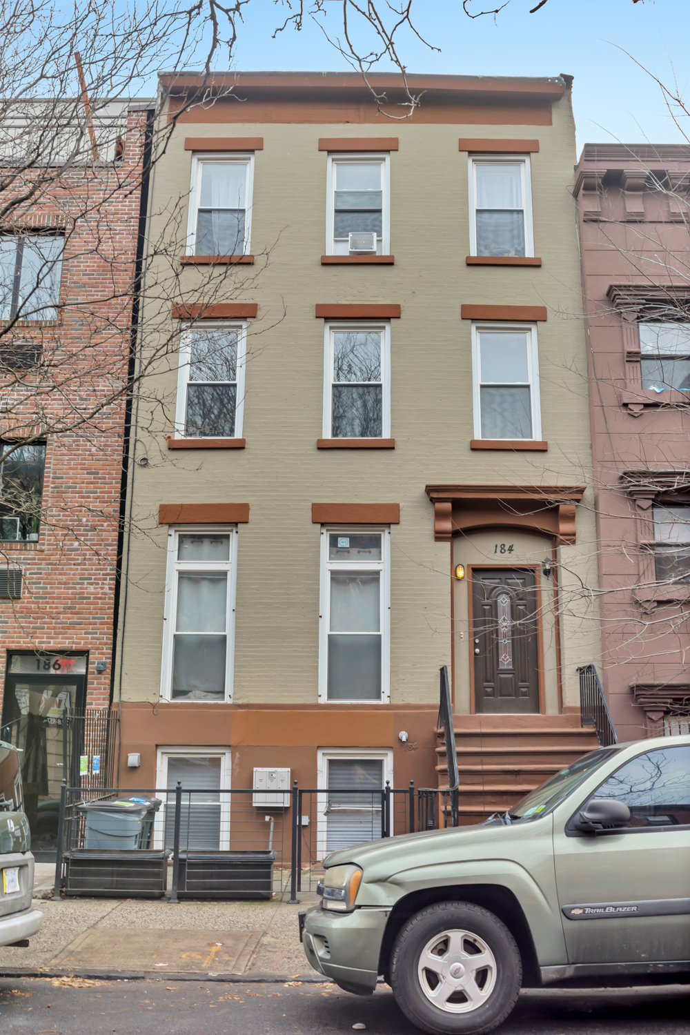 184 Herkimer Street, Unit 2 Brooklyn, NY 11216 - Photo 9 of 9 a front view of a building with parking space