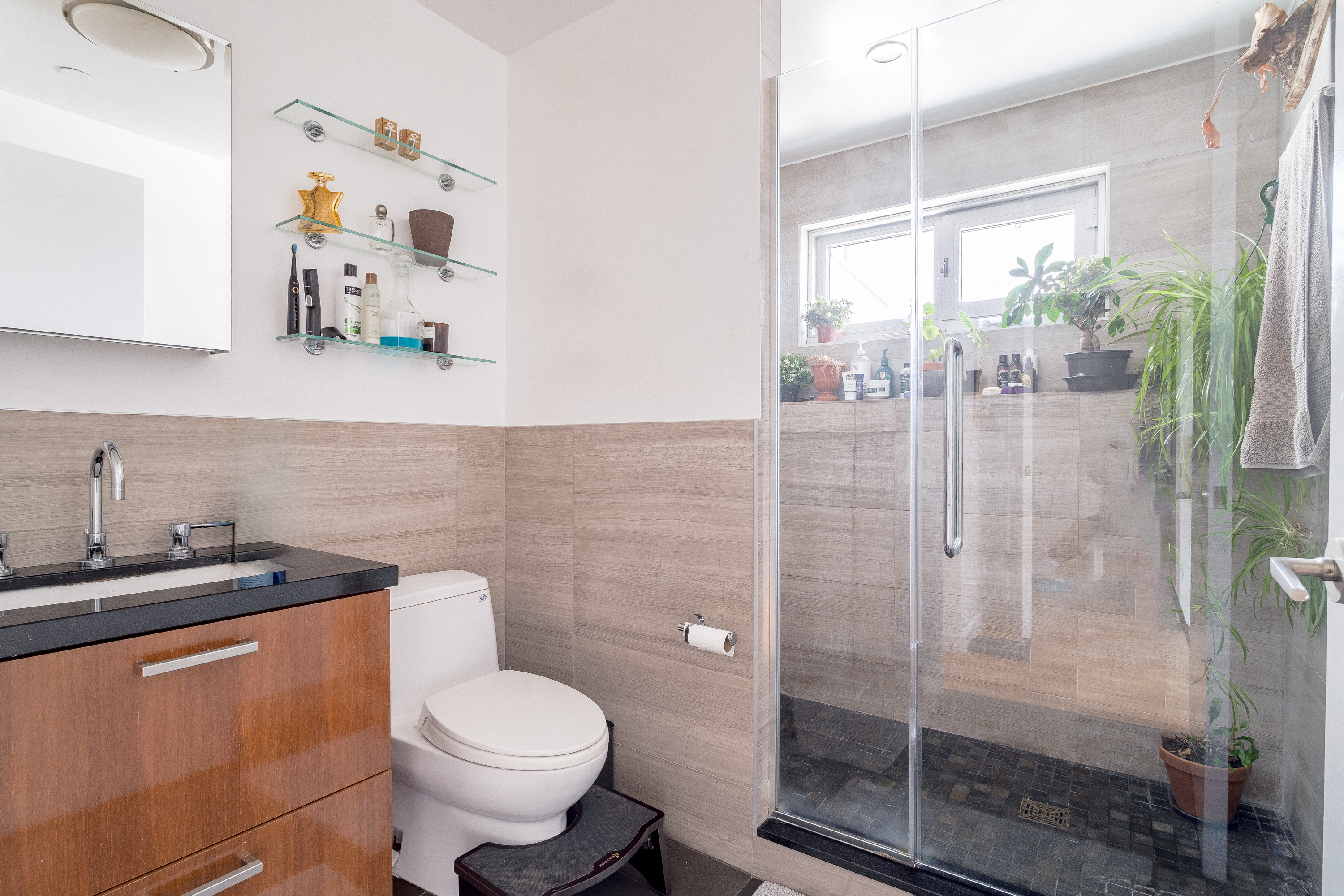 560 Carroll Street, Unit 11A Brooklyn, NY 11215 - Photo 10 of 15 a bathroom with a sink toilet and shower