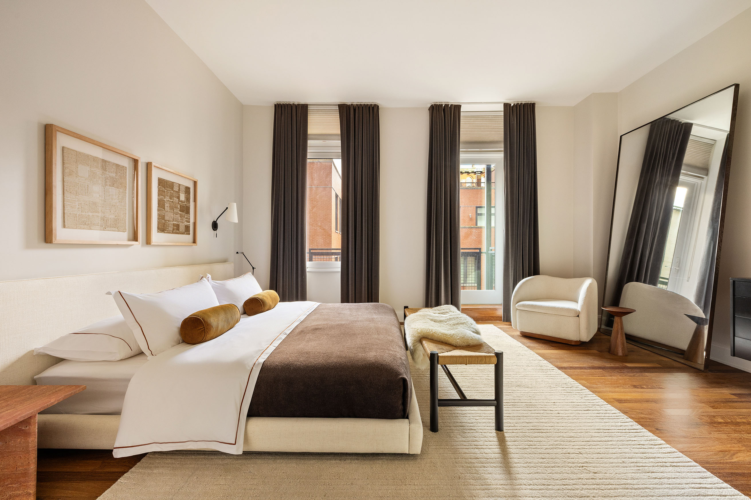 92 Laight Street, Unit 6D Manhattan, NY 10013 - Photo 8 of 15 a bedroom with a bed and a couch